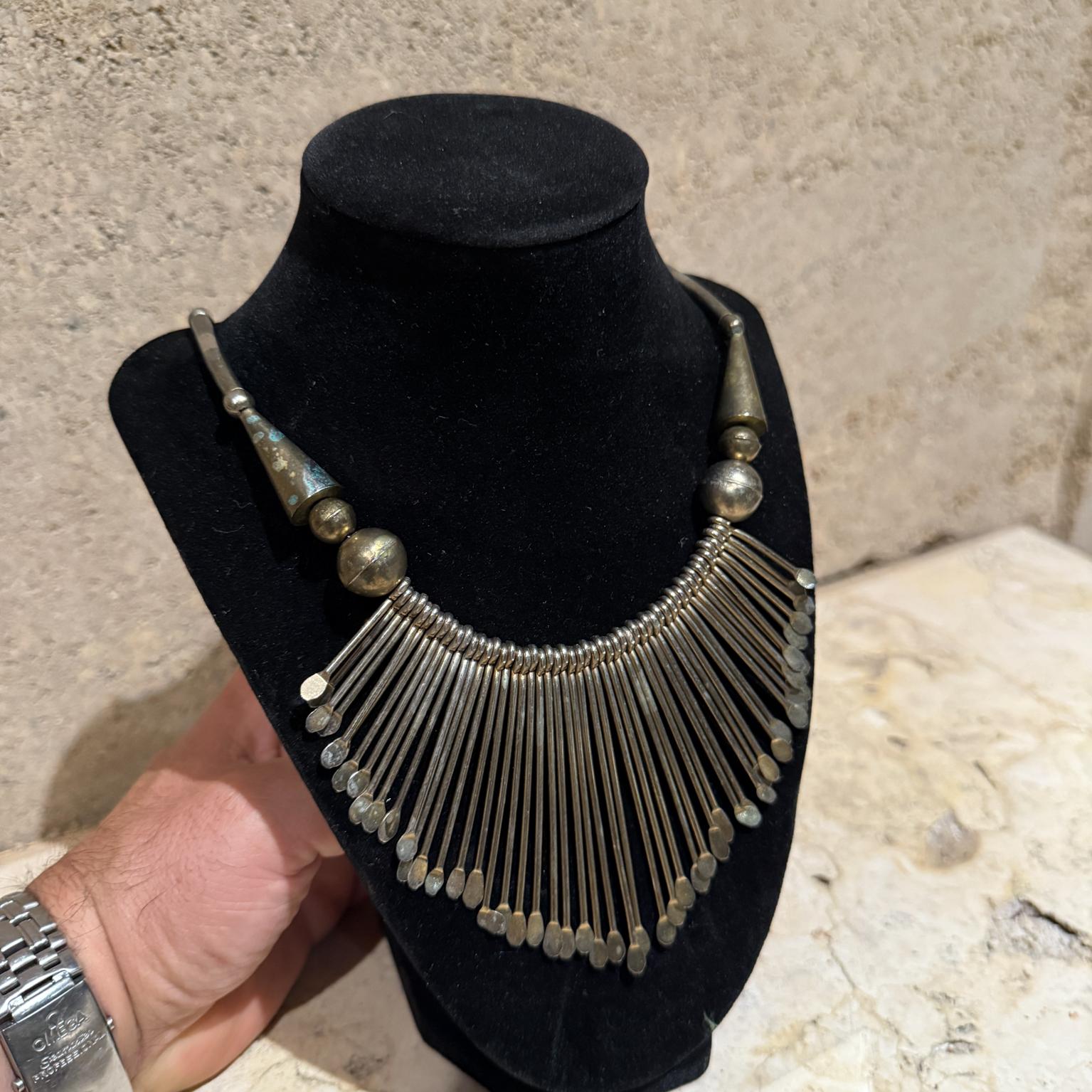 For your consideration, a Vintage Tribal Ethnic Spoon Bib Necklace.
Dimensions: 20.25 fully extended, de dent decor 4 w x 3.5 h

Please visit take a look at our listings, we have an amazing curated collection of hard to find items.

