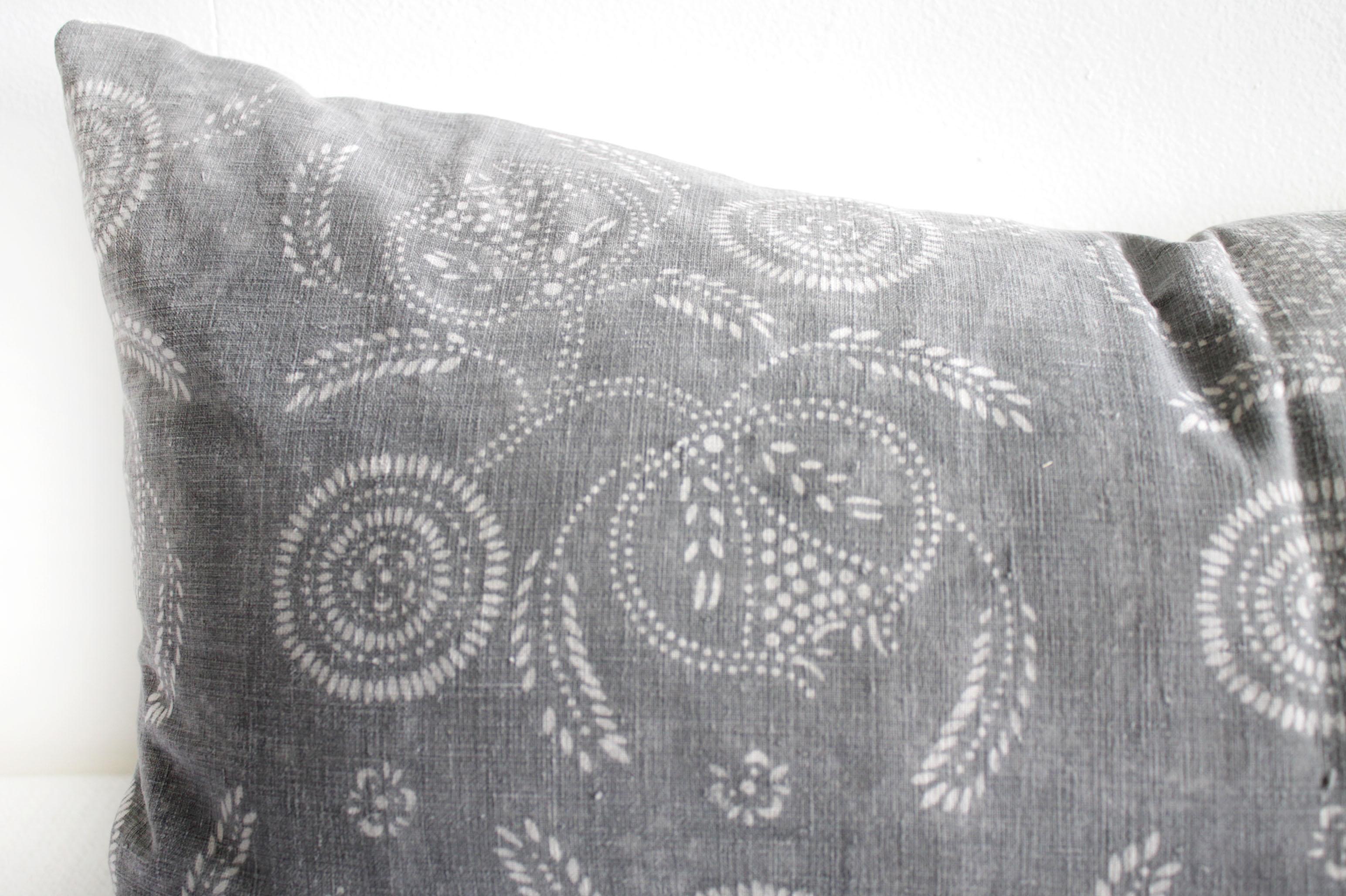 Vintage tribal gray and natural textile pillow
This beautiful pillow features a vintage textile face in a faded gray and soft white pattern. Our pillows are constructed with vintage one of a kind textiles from around the globe. Carefully