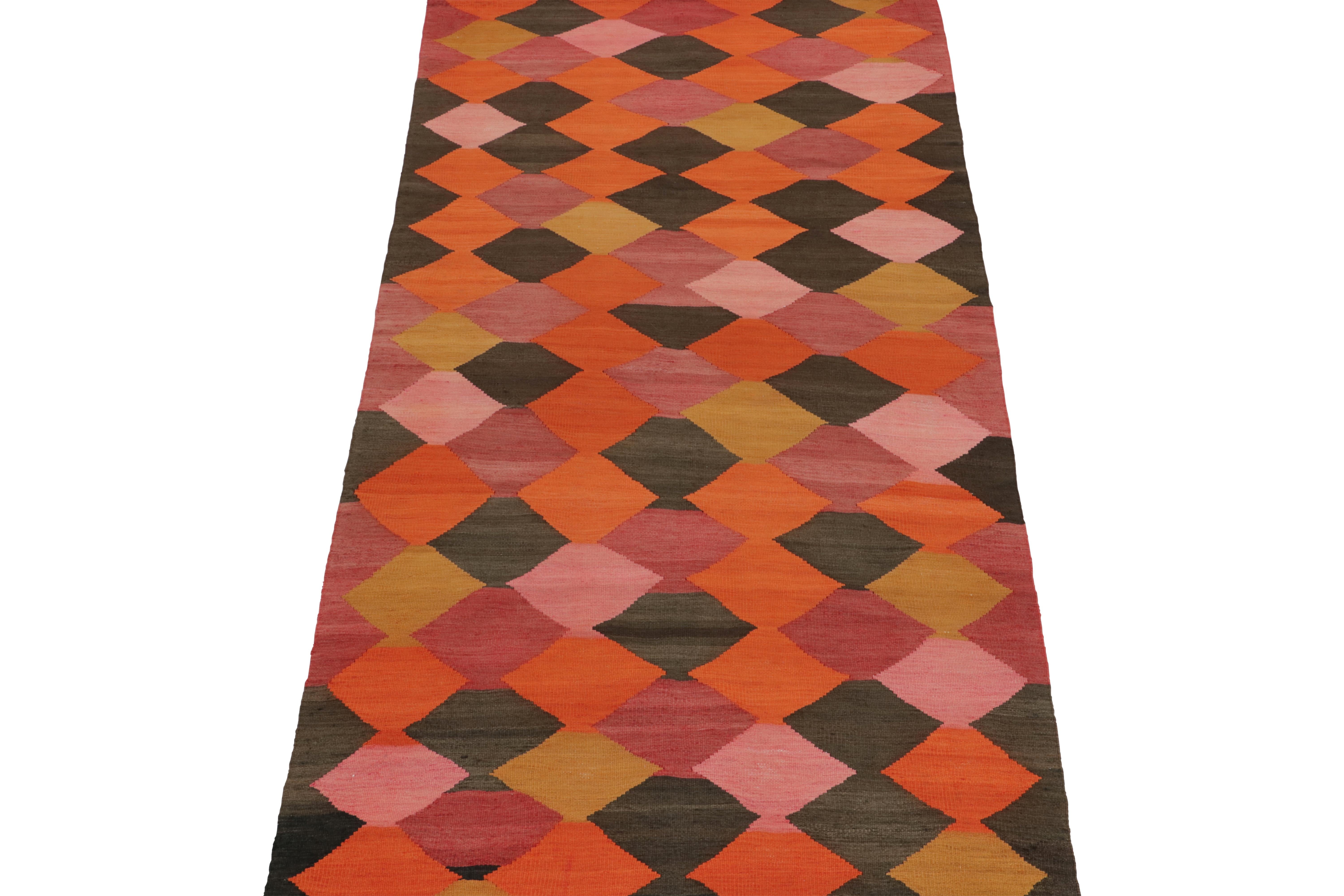 This vintage 4x9 Persian Kilim hails from the mountainous Karadagh regions of Iran, and enjoys a vibrant polychromatic design. Handwoven in wool, it originates circa 1950-1960.

On the Design: 

This runner enjoys an all over geometric pattern in