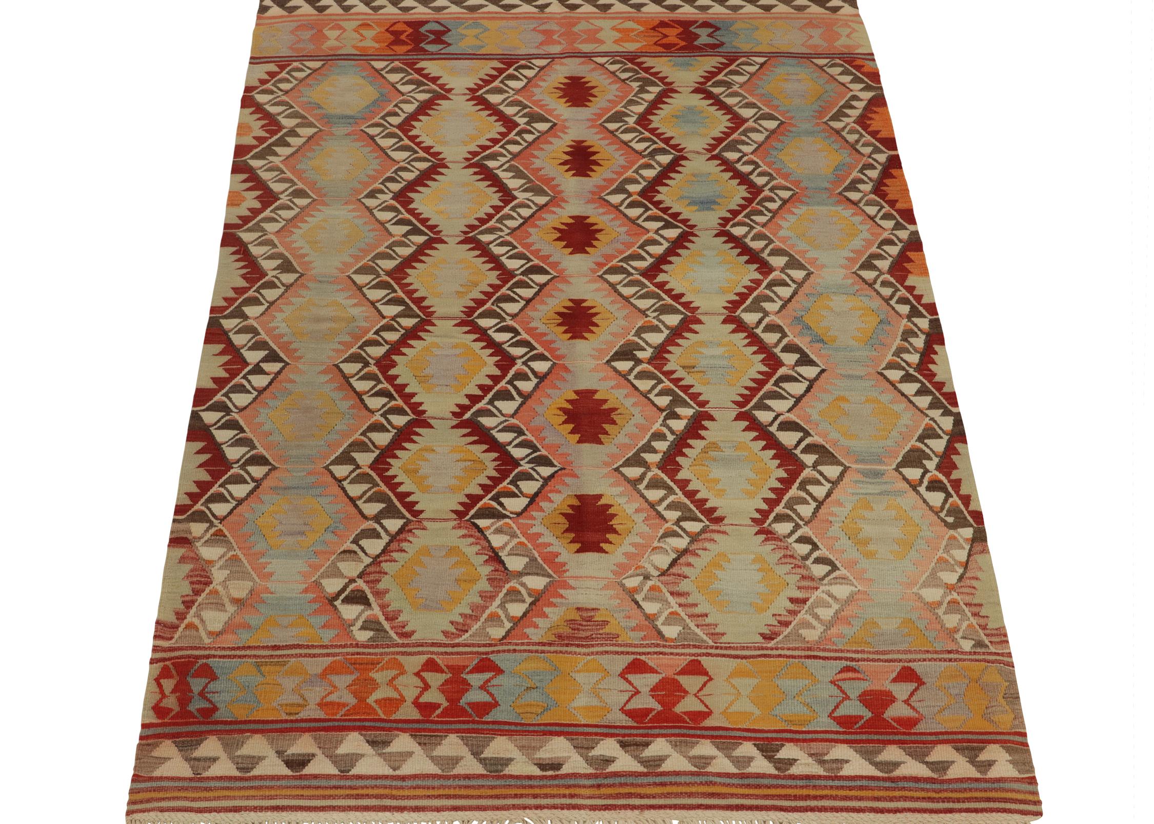 Turkish Vintage Tribal kilim rug in Polychromatic Geometric Pattern by Rug & Kilim For Sale