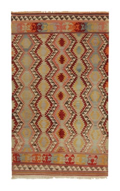 Tribal-Kelim-Teppich mit polychromem, geometrischem Muster von Teppich & Kelim