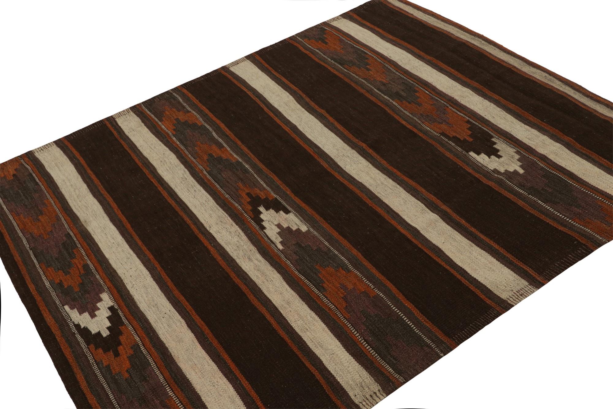 This vintage 5x6 tribal Kilim is a new addition to Rug & Kilim’s mid-century curations. Handwoven in wool, it originates from Afghanistan circa 1950-1960.

On the Design: 

This flat weave enjoys a union of tribal patterns and stripes in