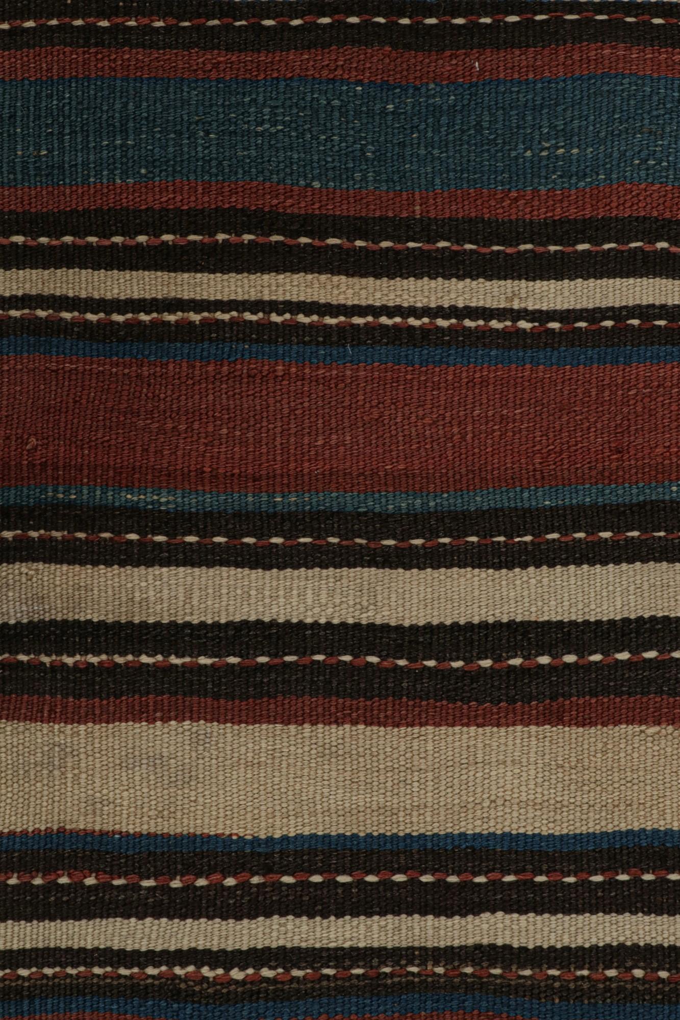 Mid-20th Century Vintage Tribal Kilim rug in Polychromatic Geometric Patterns by Rug & Kilim For Sale