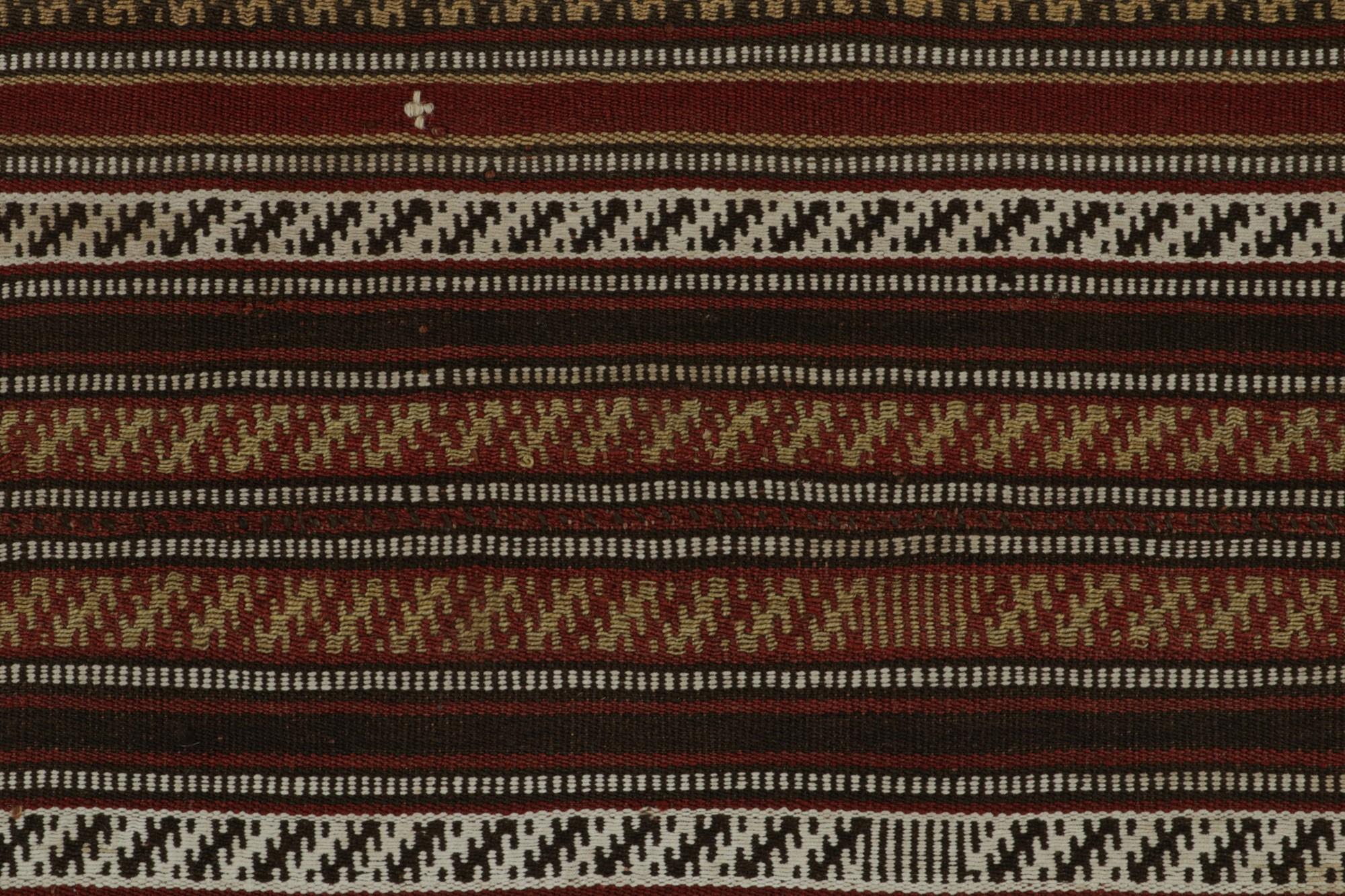 Mid-20th Century Vintage Tribal Kilim rug in Polychromatic Geometric Patterns by Rug & Kilim For Sale