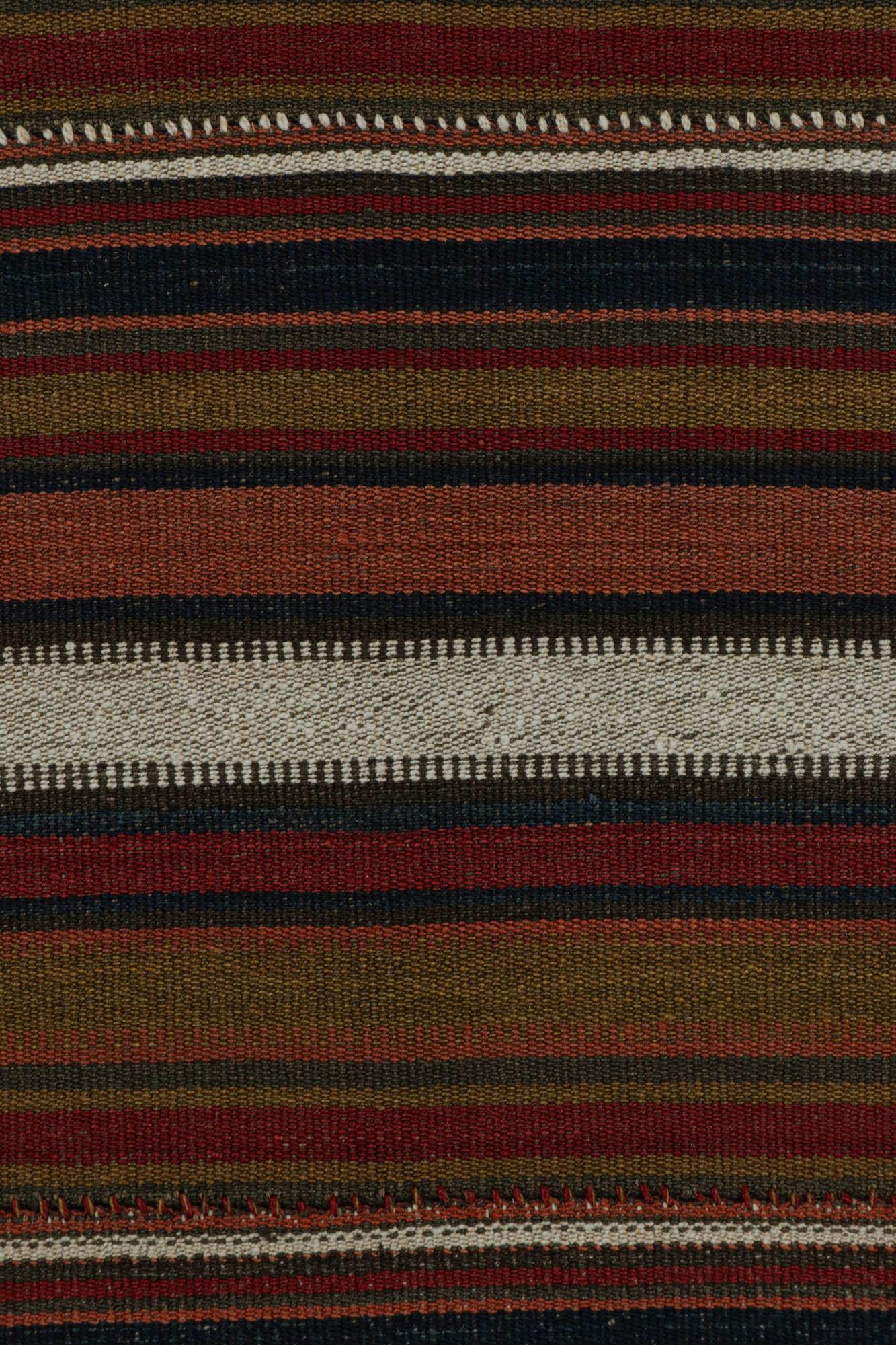 Mid-20th Century Vintage Tribal Kilim rug in Polychromatic Stripes by Rug & Kilim For Sale