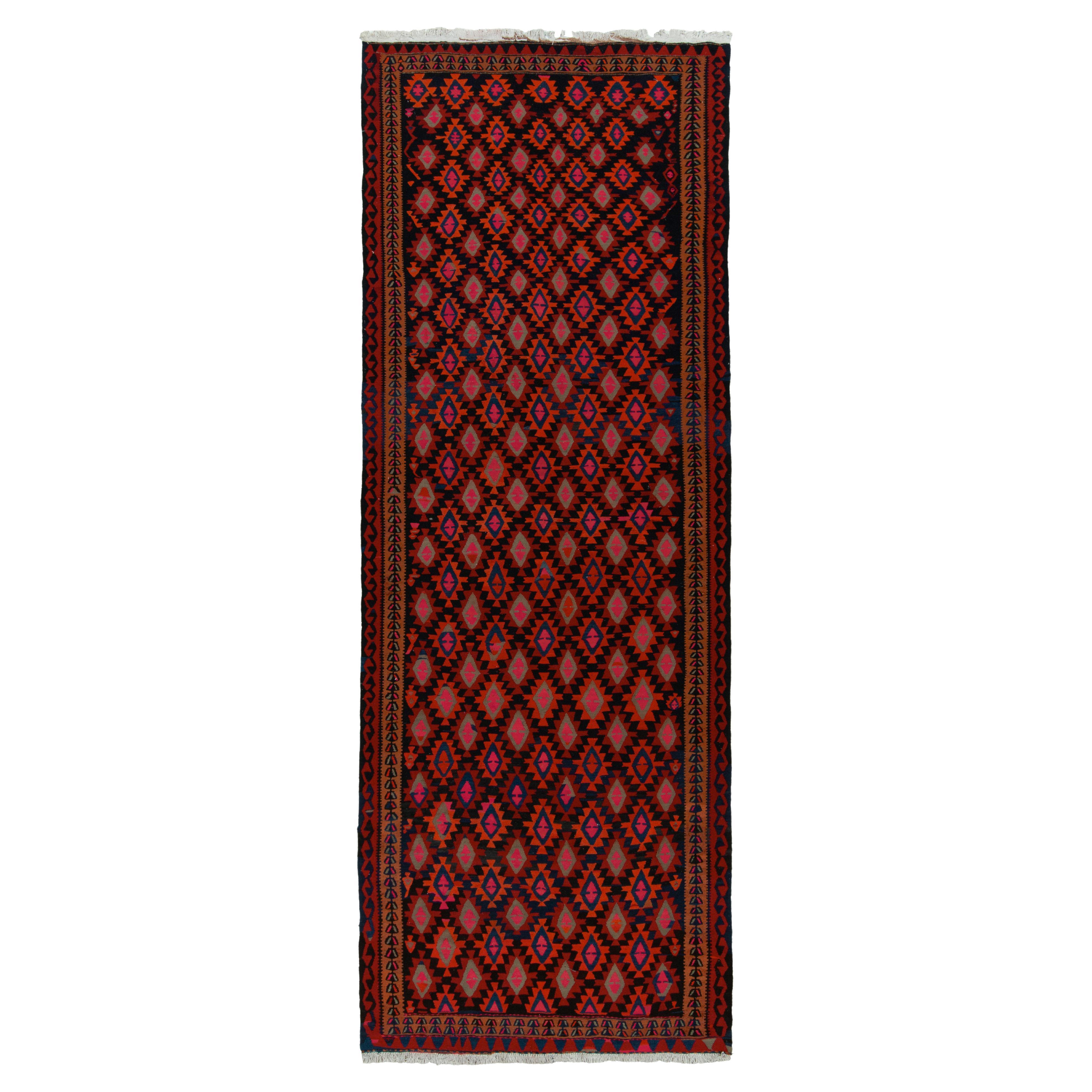 Vintage Stammeskunst-Kelim-Teppich in Rot, Schwarz und Blau mit geometrischem Muster von Teppich & Kelim