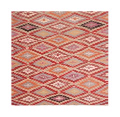 Tappeto tribale Kilim vintage con motivi geometrici rossi, arancioni e blu