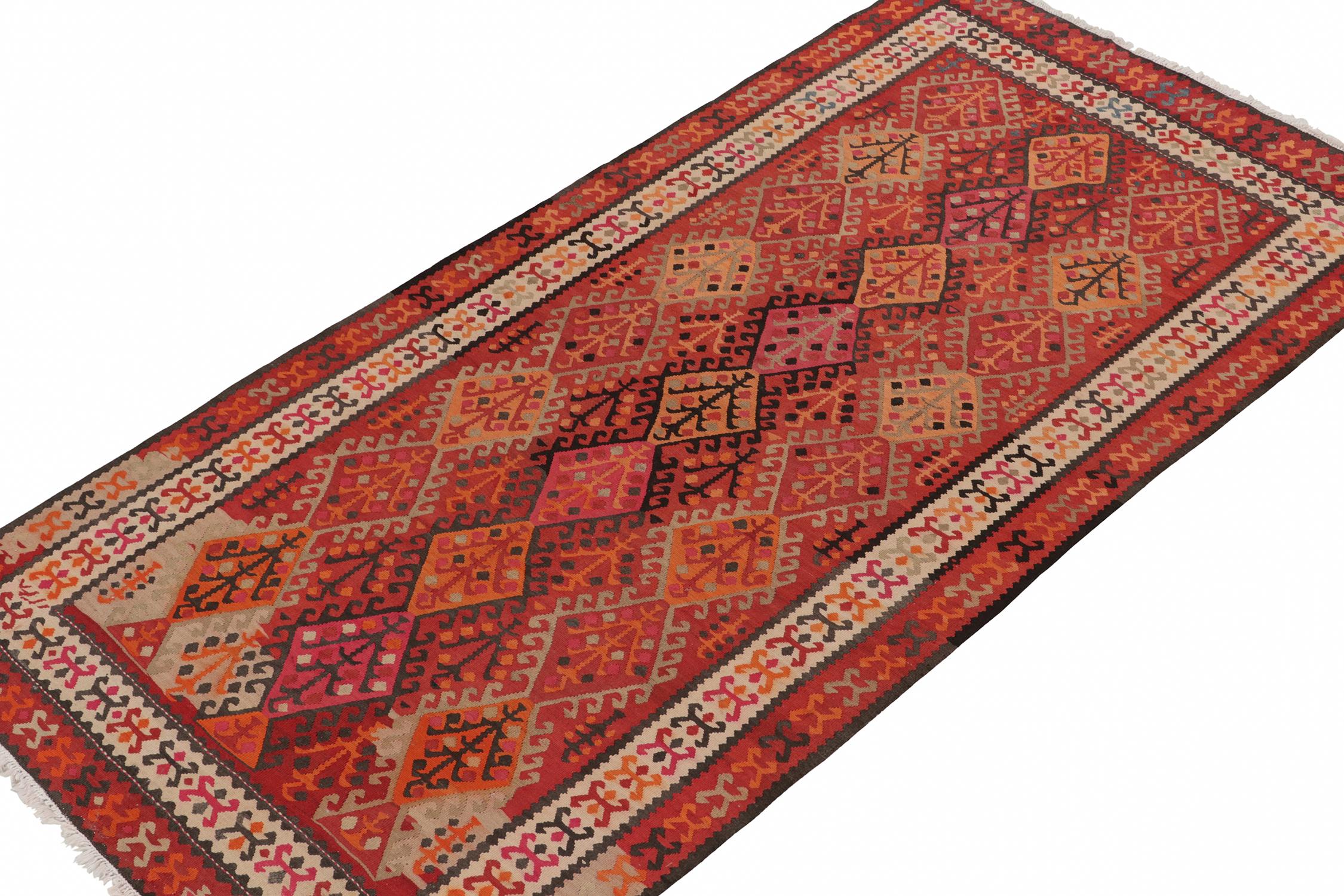 This vintage 5x10 Kilim is a new addition to Rug & Kilim’s rare tribal curations. Handwoven in wool, it originates from Turkey circa 1950-1960. 

Further On the Design: 

This gallery runner prefers elaborate geometric patterns in red, rust