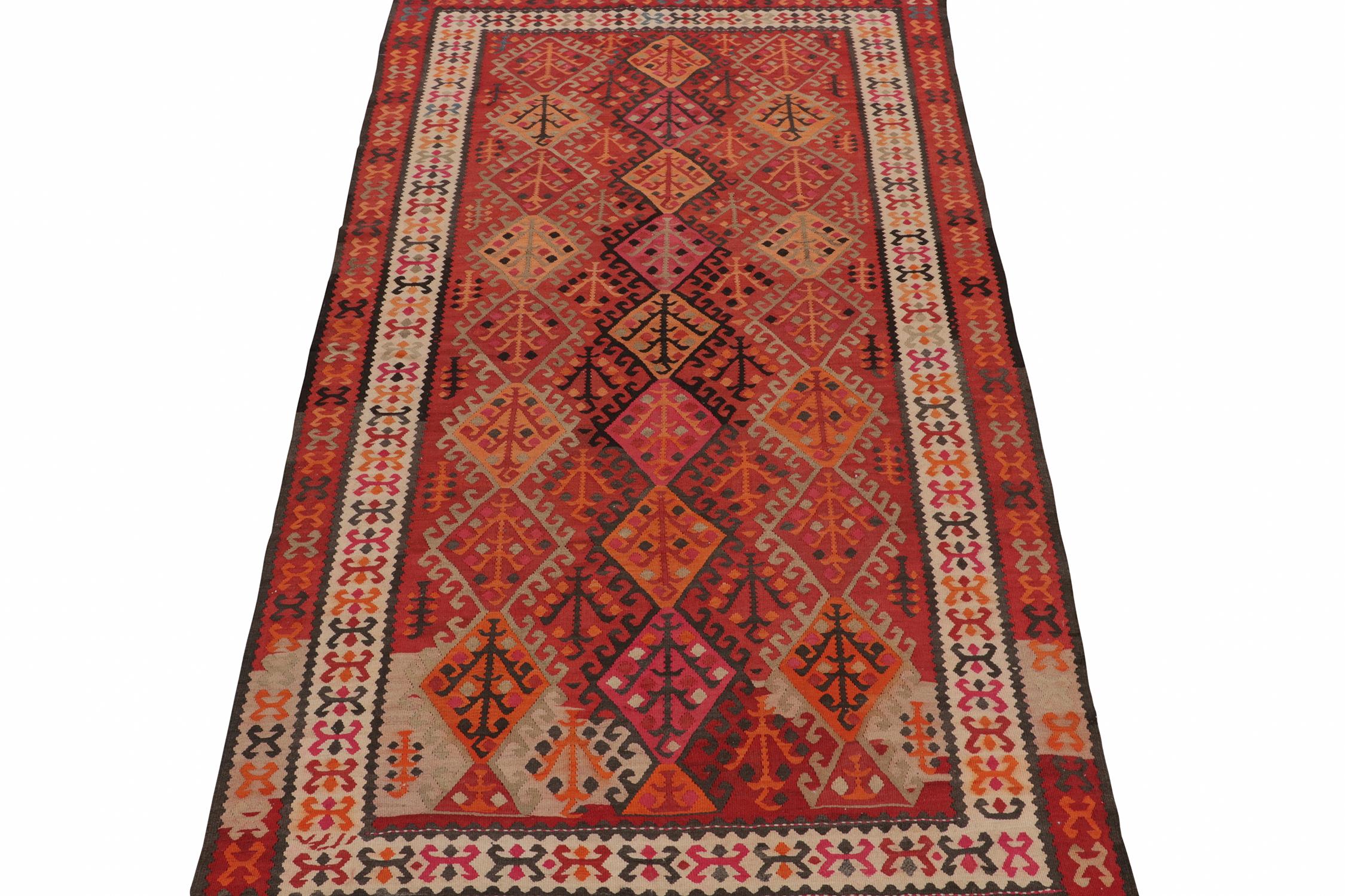 Turkish Vintage Tribal Kilim Rug in Red with Colorful Geometric Patterns by Rug & Kilim For Sale