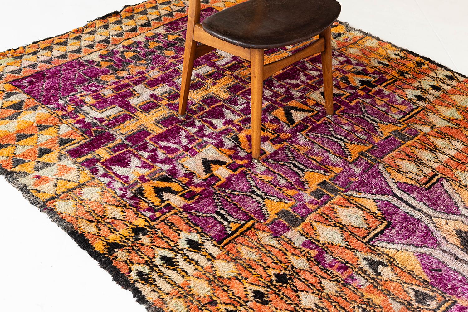 A beautiful vintage tribal Moroccan that is nothing short of a true gem. Beautiful saturated colors weaved together by the Azilal tribe into a unique and symbolic design. This antique piece will leave lasting impressions and will add color to add