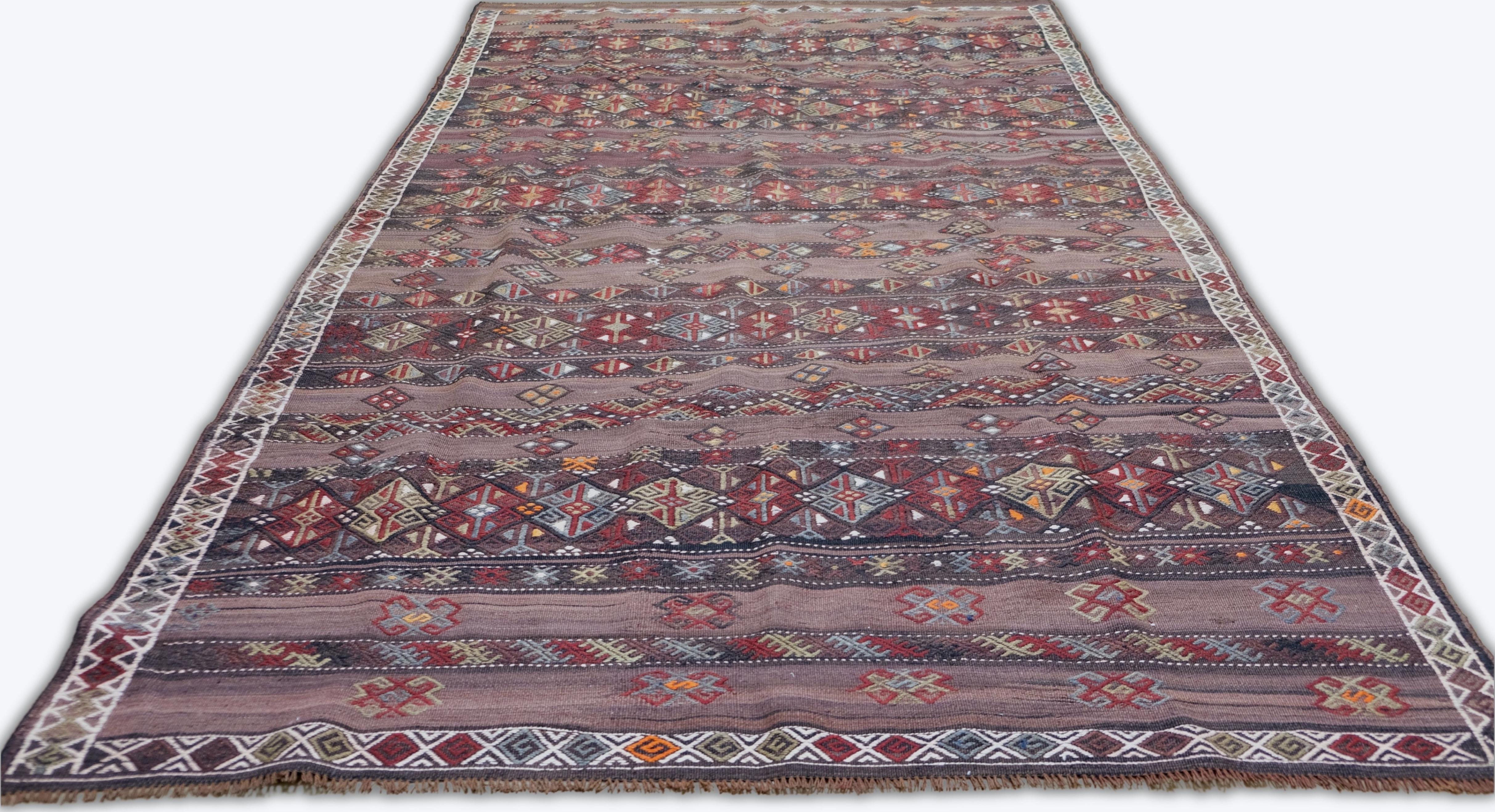 20th Century Vintage Tribal Motif Earthy Plum Hand Woven Rug 6'8''x11'1'' For Sale