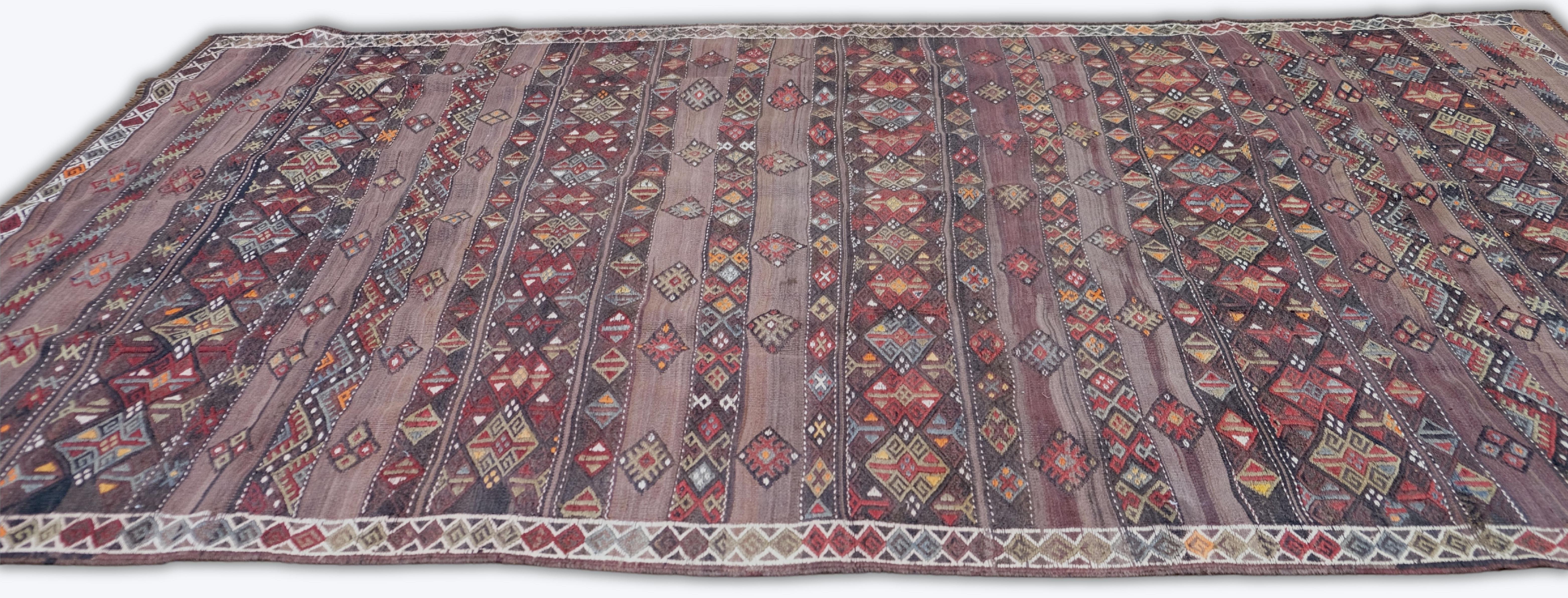 Wool Vintage Tribal Motif Earthy Plum Hand Woven Rug 6'8''x11'1'' For Sale