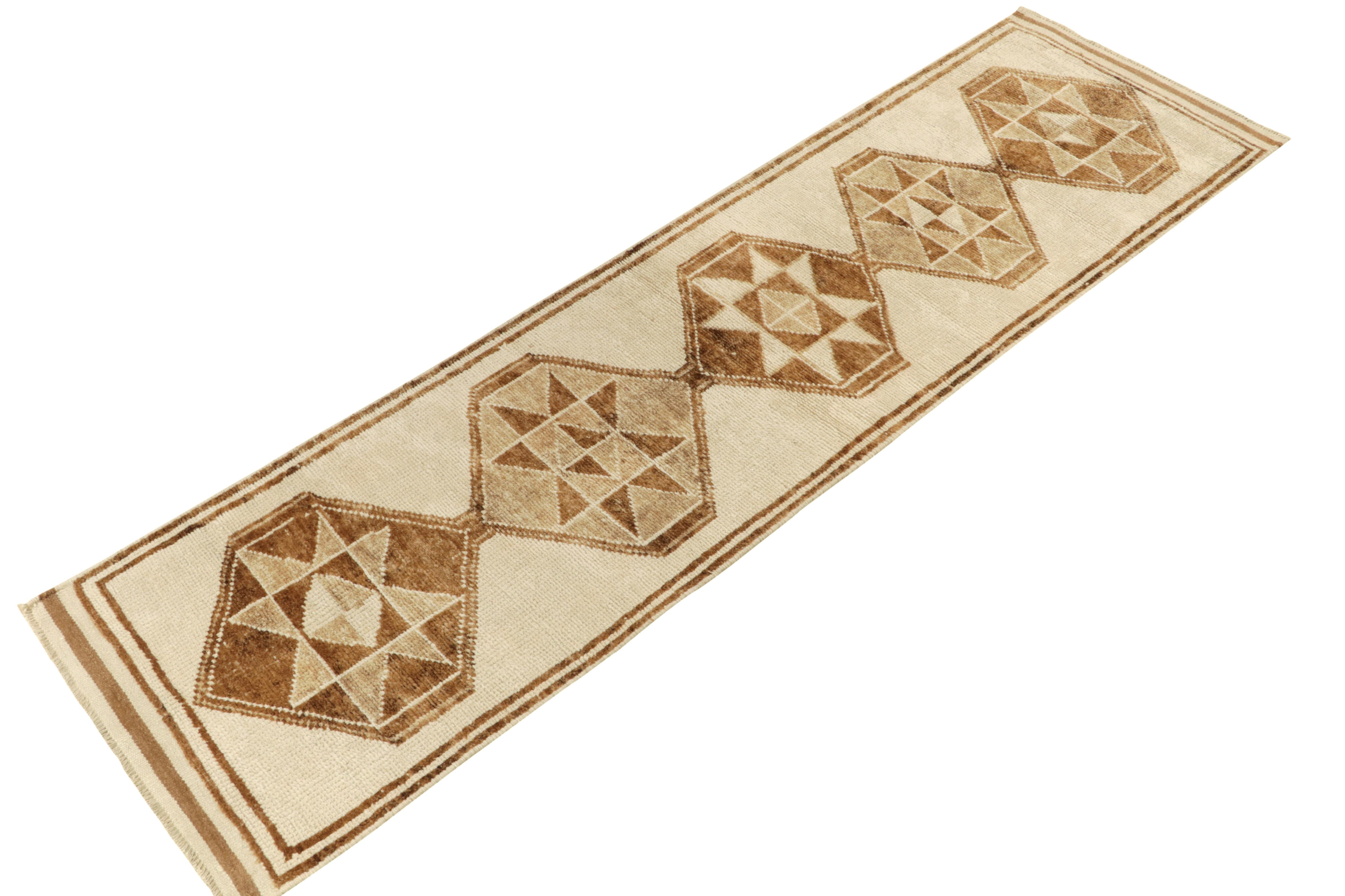 From Rug & Kilim’s vintage selections, a 3x11 hand-knotted wool runner of warm hues and good condition among nomadic rugs. 

This 1950s tribal piece from Turkey showcases traditional motifs sitting confidently like medallions on the field in a