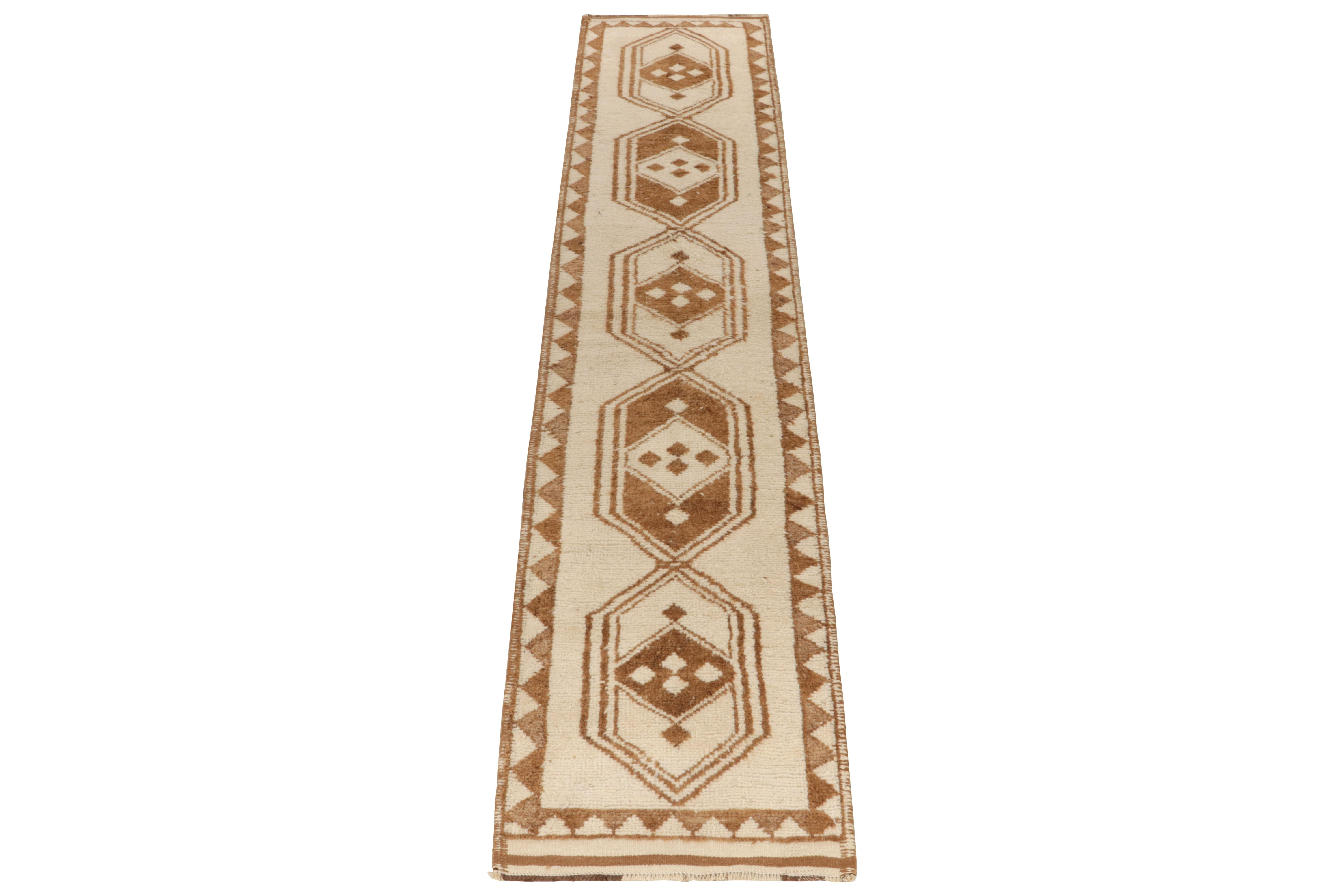 From Rug & Kilim’s vintage selections, a 3x14 hand-knotted wool runner of uniquely bright hues for nomadic inspirations. 

This 1950s tribal piece from Turkey showcases traditional motifs sitting confidently like medallions on the field in creamy