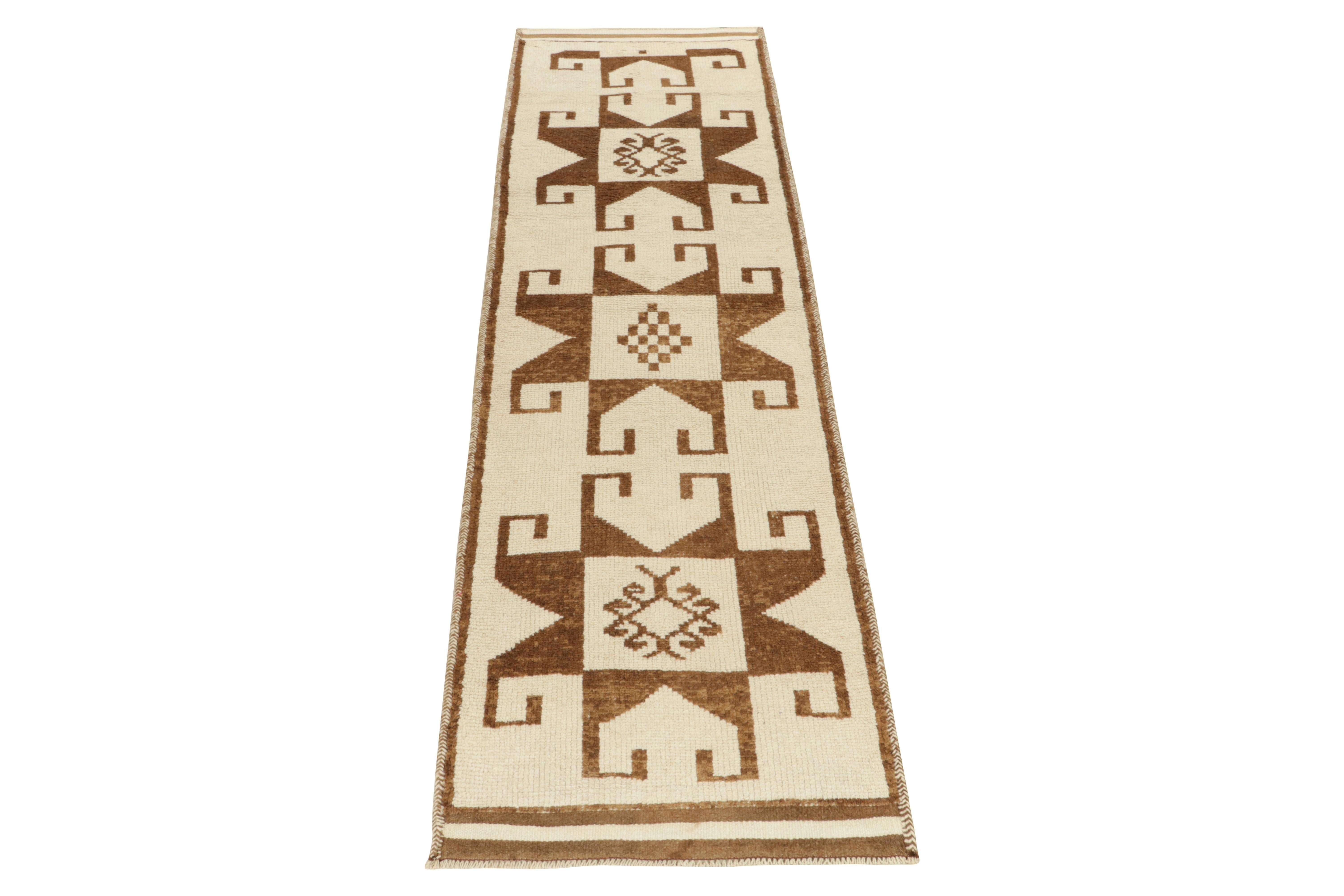 From Rug & Kilim’s vintage selections, a 3x12 hand-knotted wool runner of uniquely forgiving hues for its nomadic sensibility. 

This 1950s tribal piece from Turkey showcases traditional motifs sitting confidently like medallions on the field in