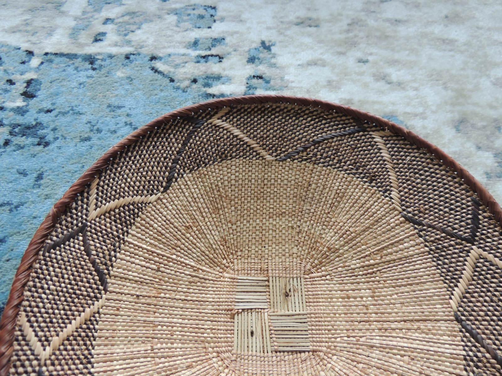 Hand-Crafted Vintage Tribal Tan and Brown Woven Round African Basket