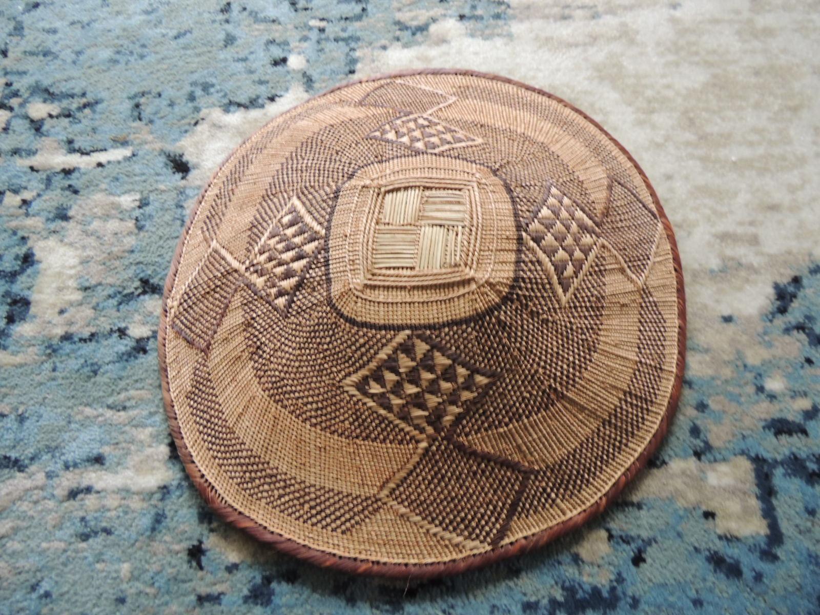 Late 20th Century Vintage Tribal Tan and Brown Woven Round African Basket