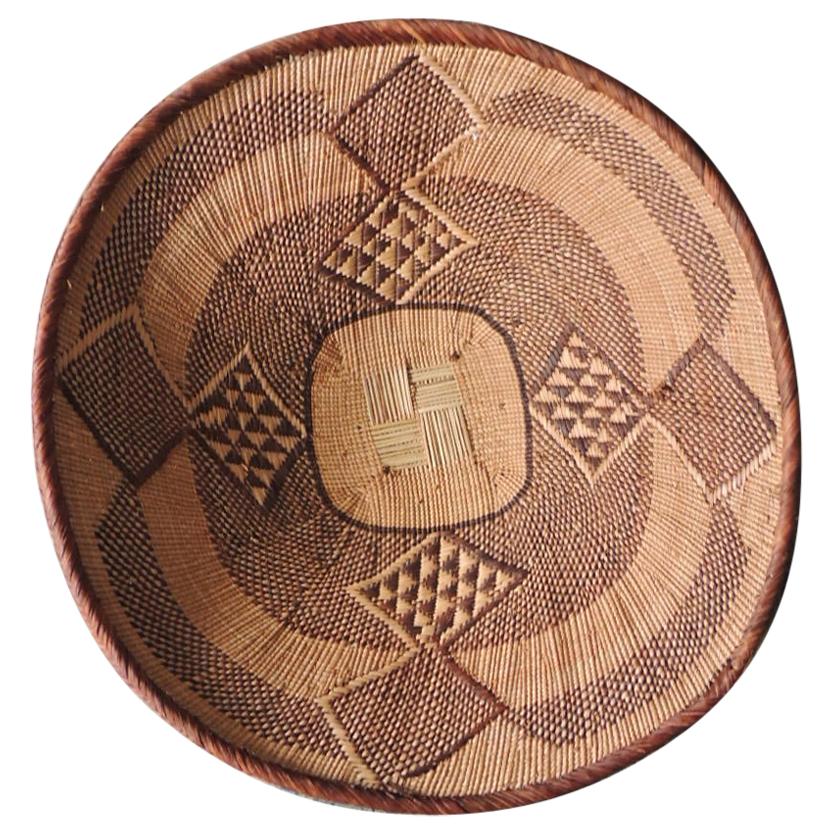 Vintage Tribal Tan and Brown Woven Round African Basket