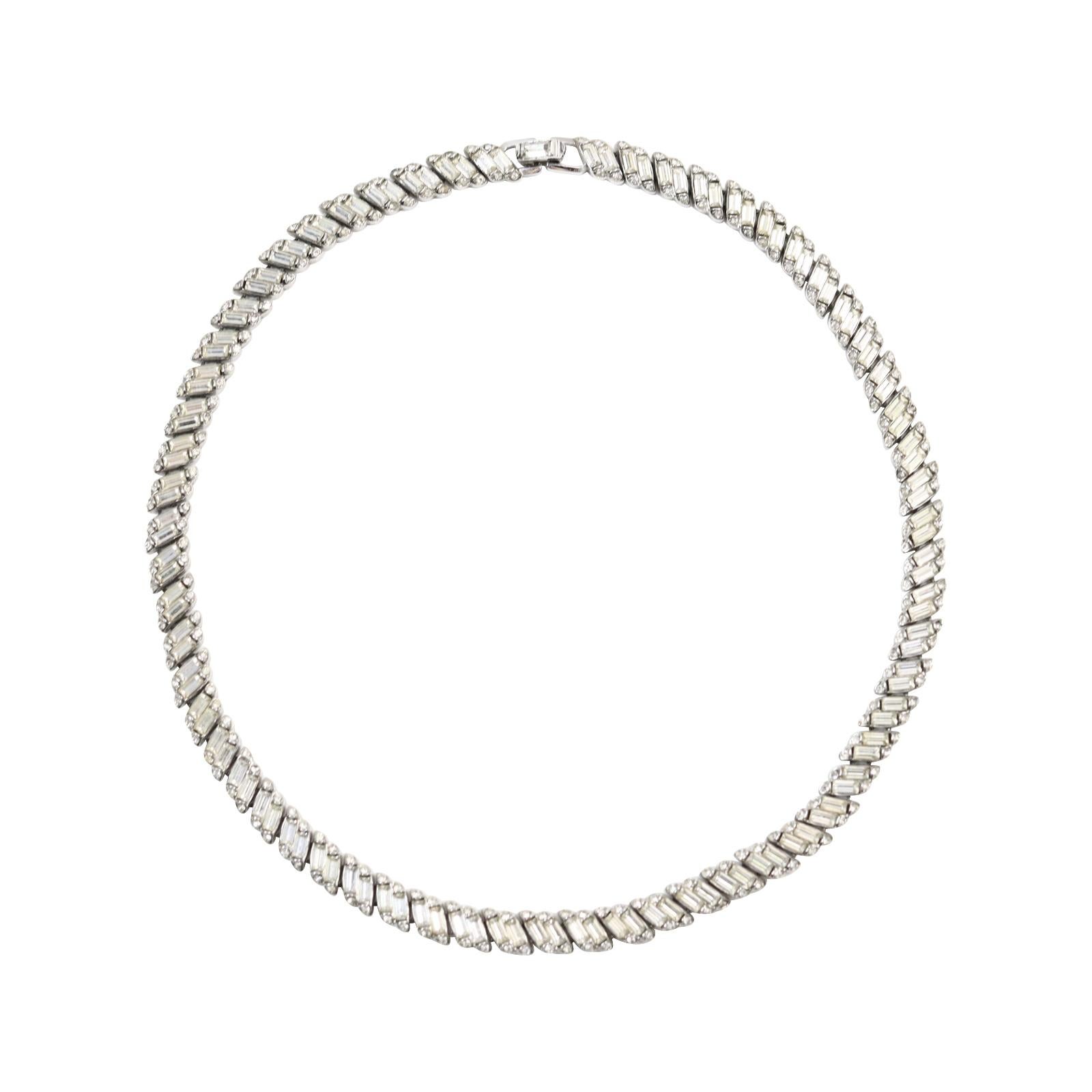 Vintage Trifari Baguette Tennis Necklace Choker Circa 1960s. The dates of this necklace make it between 1955-1969. This looks like a very expensive classic necklace.  It is all prong set and wow does it deliver. In great Shape.  You need nothing
