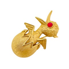 Vintage TRIFARI crown gold pink cabochon eye egg duck figural designer brooch