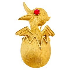 Vintage TRIFARI crown gold pink cabochon eye egg duck figural designer brooch 