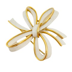 Vintage TRIFARI crown gold white enamel flower bow designer runway brooch