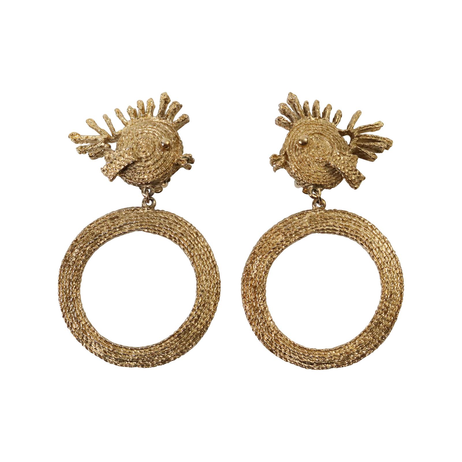 Vintage Trifari Gold Tone Dangling Fish Hoop Earrings, circa 1980s.  I love these earrings and have them in my collection.  They are just amazing.  There is a pair of fish on top of large, dangling hoops that have a textured design, and they never