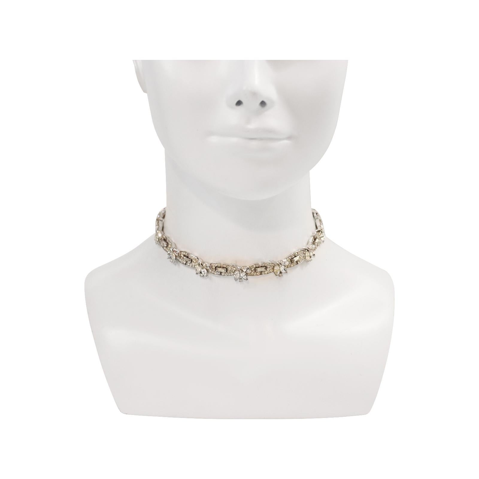Vintage Trifari Pave and Pear Choker Circa 1960s. This is a link choker that has pave that is separated with a piece of baguette and then has pear shapes of diamante that are placed on top with one piece in the middle that seems to come over from