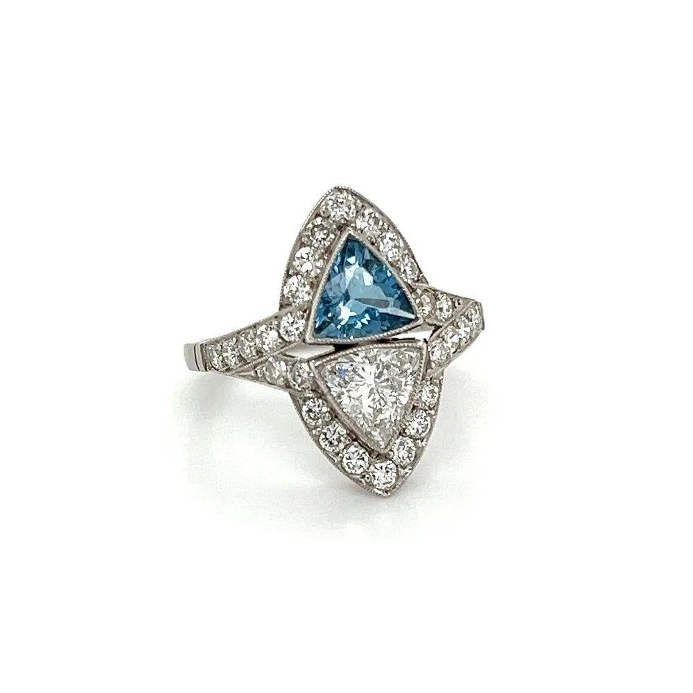 Simply Beautiful! Trillion Aquamarine and Trillion Diamond Platinum Vintage Cocktail Ring. Featuring a Securely Hand set Trillion Aquamarine, weighing approx. 0.80 Carats and Trillion Diamond, weighing approx. 0.70tcw in six-prong setting.