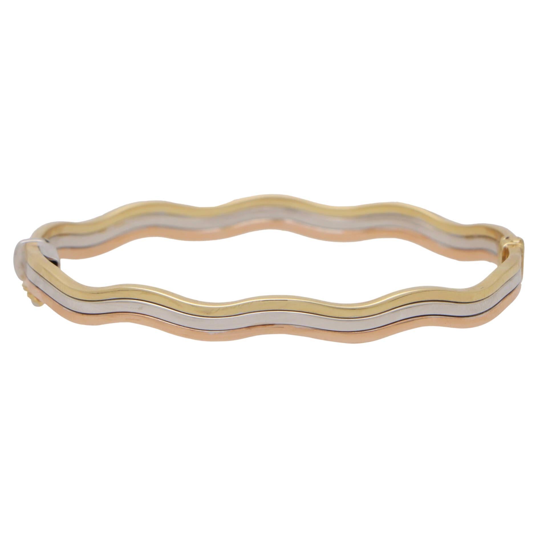  Vintage Trinity Wave Bangle in 9k Gold For Sale