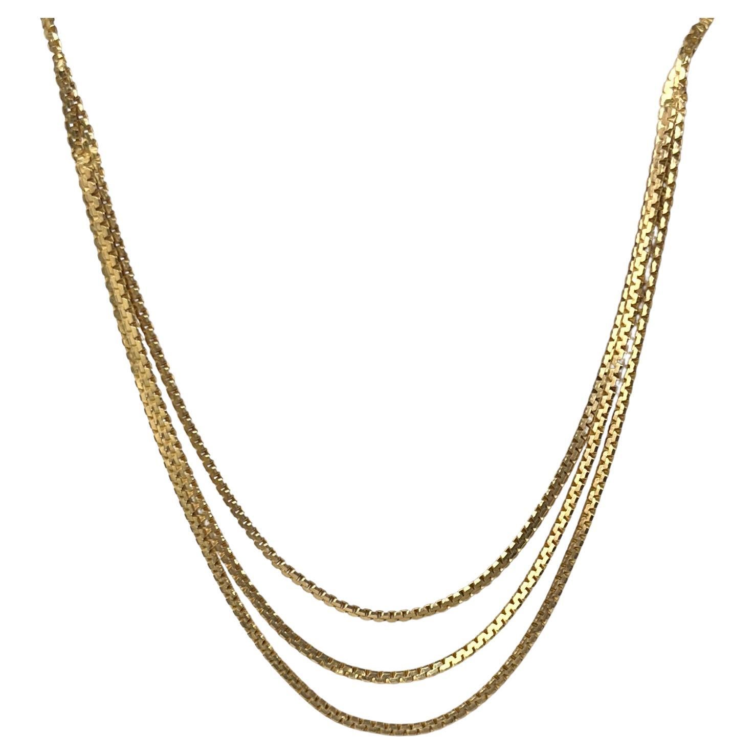 Collier vintage à trois chaînes en or 9 carats en vente