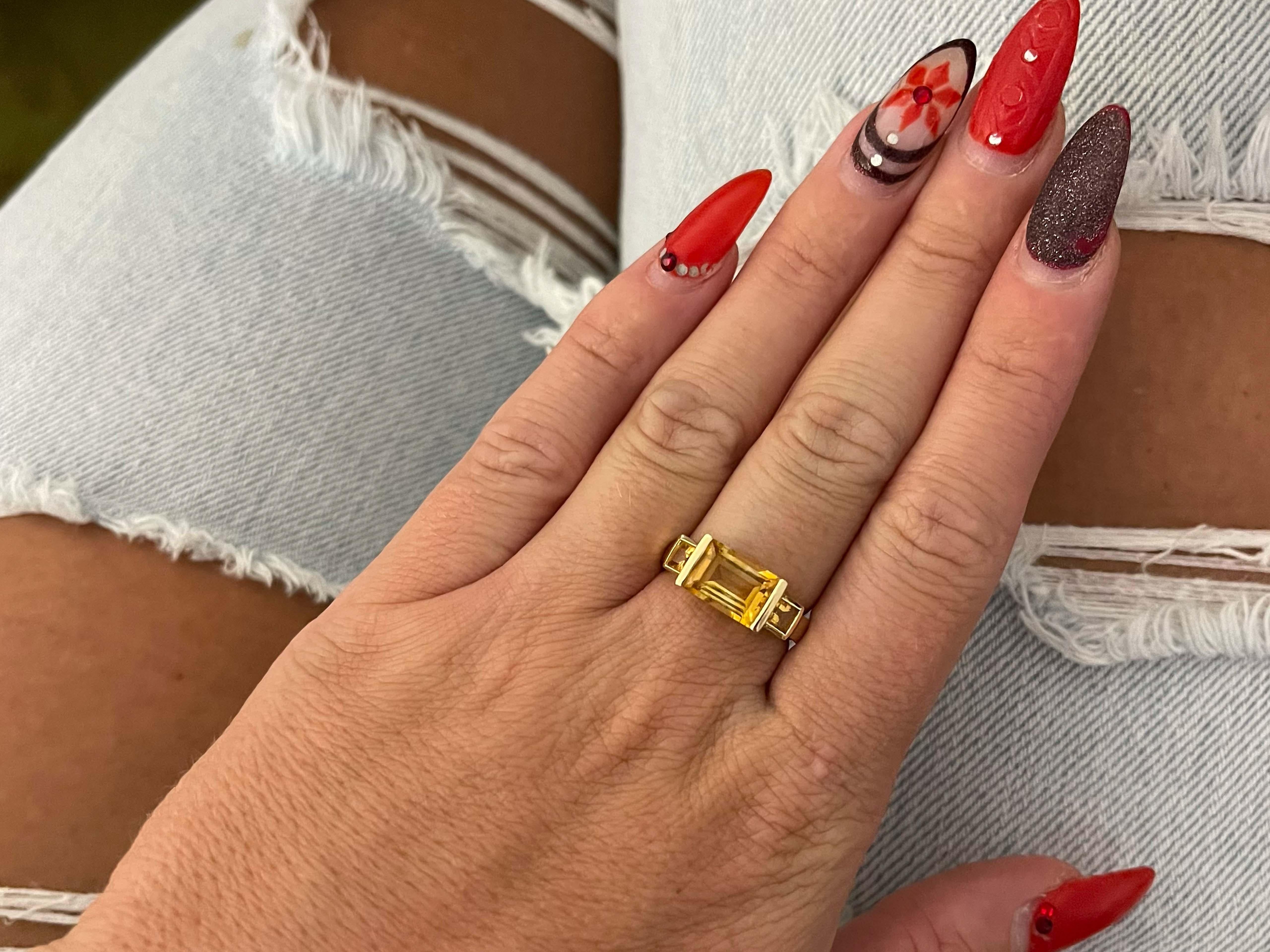 Item Specifications:

Metal: 14k Yellow Gold

Style: Statement Ring

Ring Size: 7 (resizing available for a fee)

Total Weight: 5 Grams

Gemstone Specifications: Citrine 

Center Gemstone Measurements: 11.8 mm x 7mm x 5 mm

Color: Golden Yellow