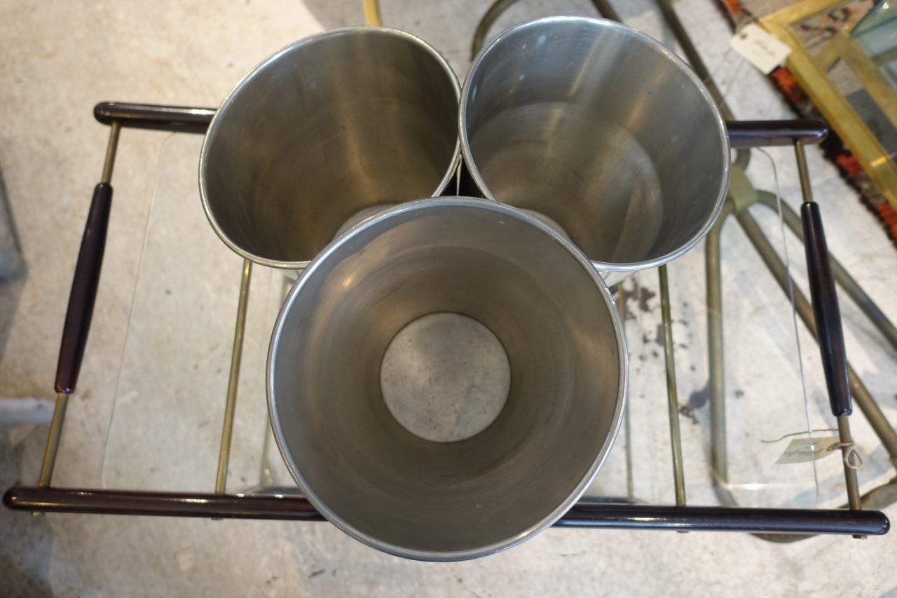 Very rare and super cool triple ice bucket / wine cooler. Made of tin, from the renowned champagne house of Deutz. Fabulous eye catching shape, and the three tubs have brass plates on the sides.

The perfect ingredient for a party life. Would make