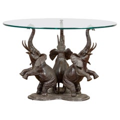Base de table basse vintage à trois éléphants surélevés avec patine foncée, 20ème siècle