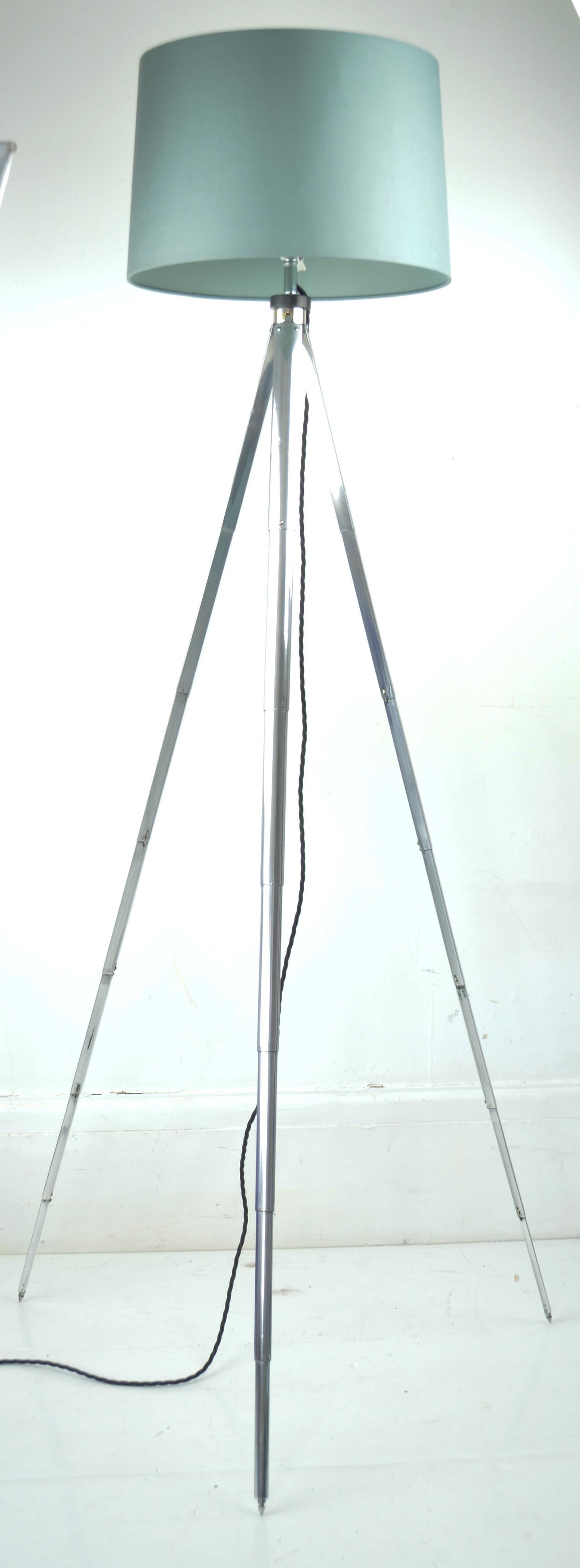 Originally a camera tripod. The tubular aluminium is telescopic.

The piece has been converted to a light fitting.

The legs are adjustable so you can change the height.

The height measurement I give below relates to the position in the