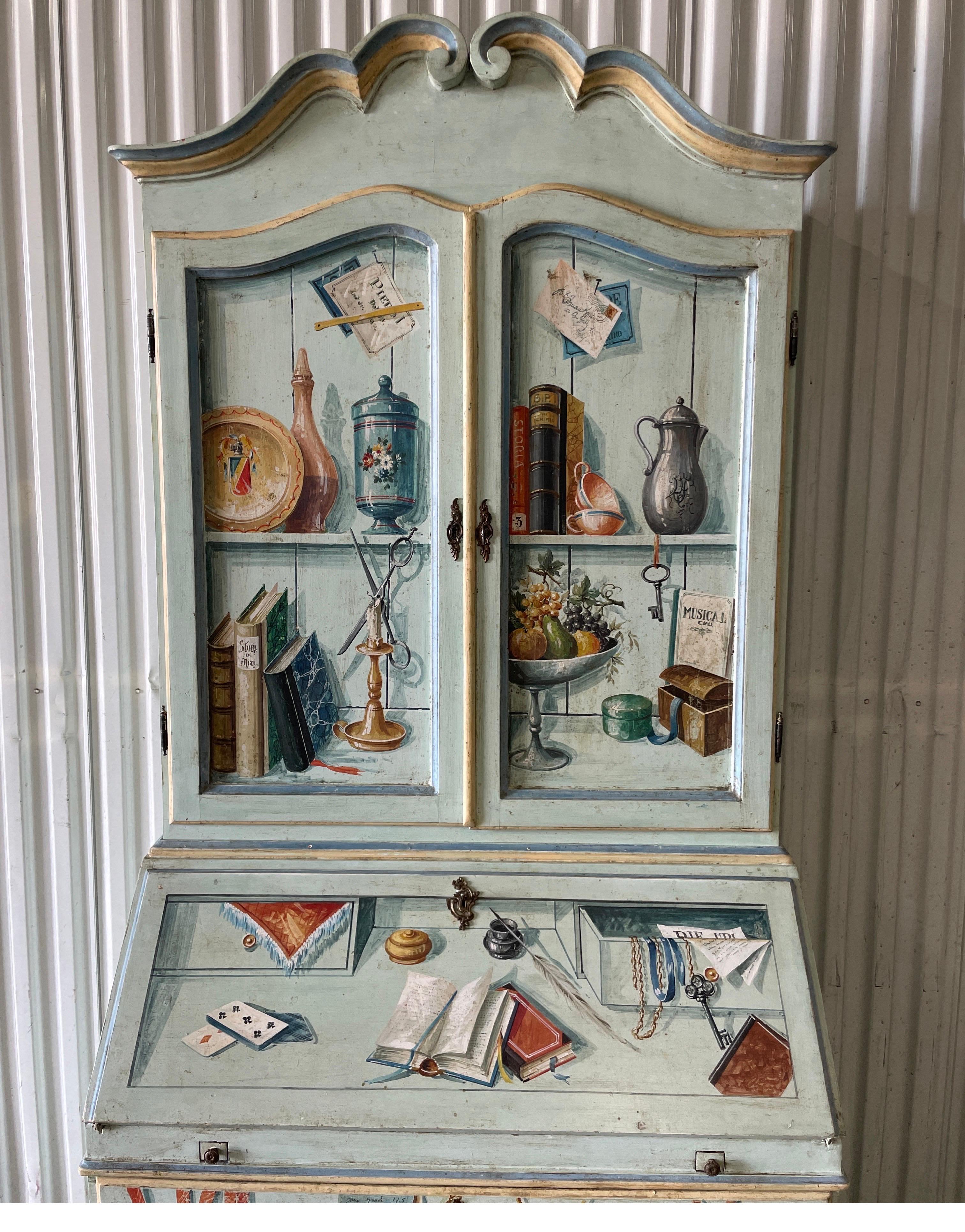 Vintage Italian hand painted Secretary in the style of Fornasetti. An outstanding, finely executed piece with great attention to detail inside and out. The piece is made in two parts.