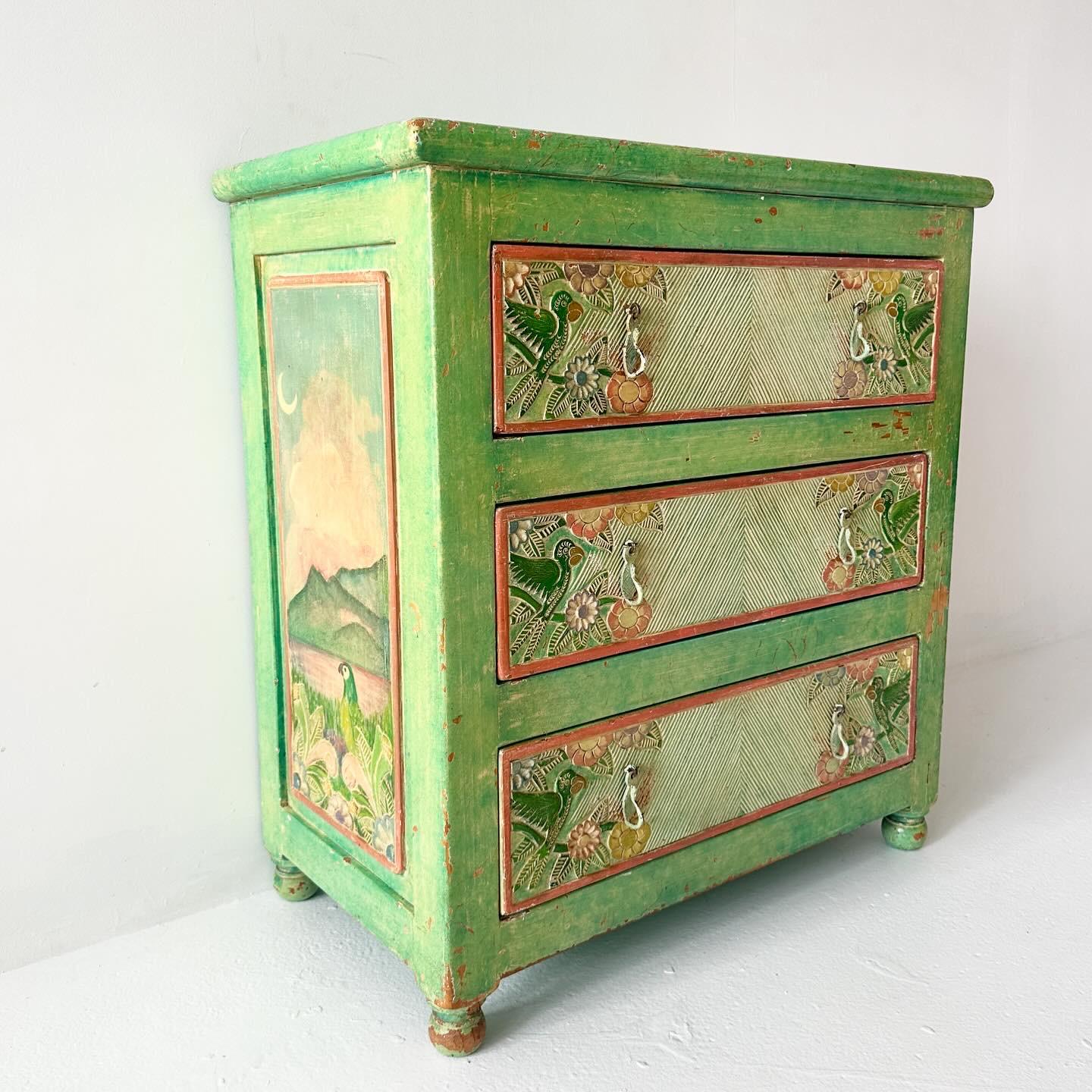 Vintage tropical carved wood and hand painted dresser by Arte De Mexico (San Fernando Valley, 1990s).

Vintage condition, patina and wear on paint.