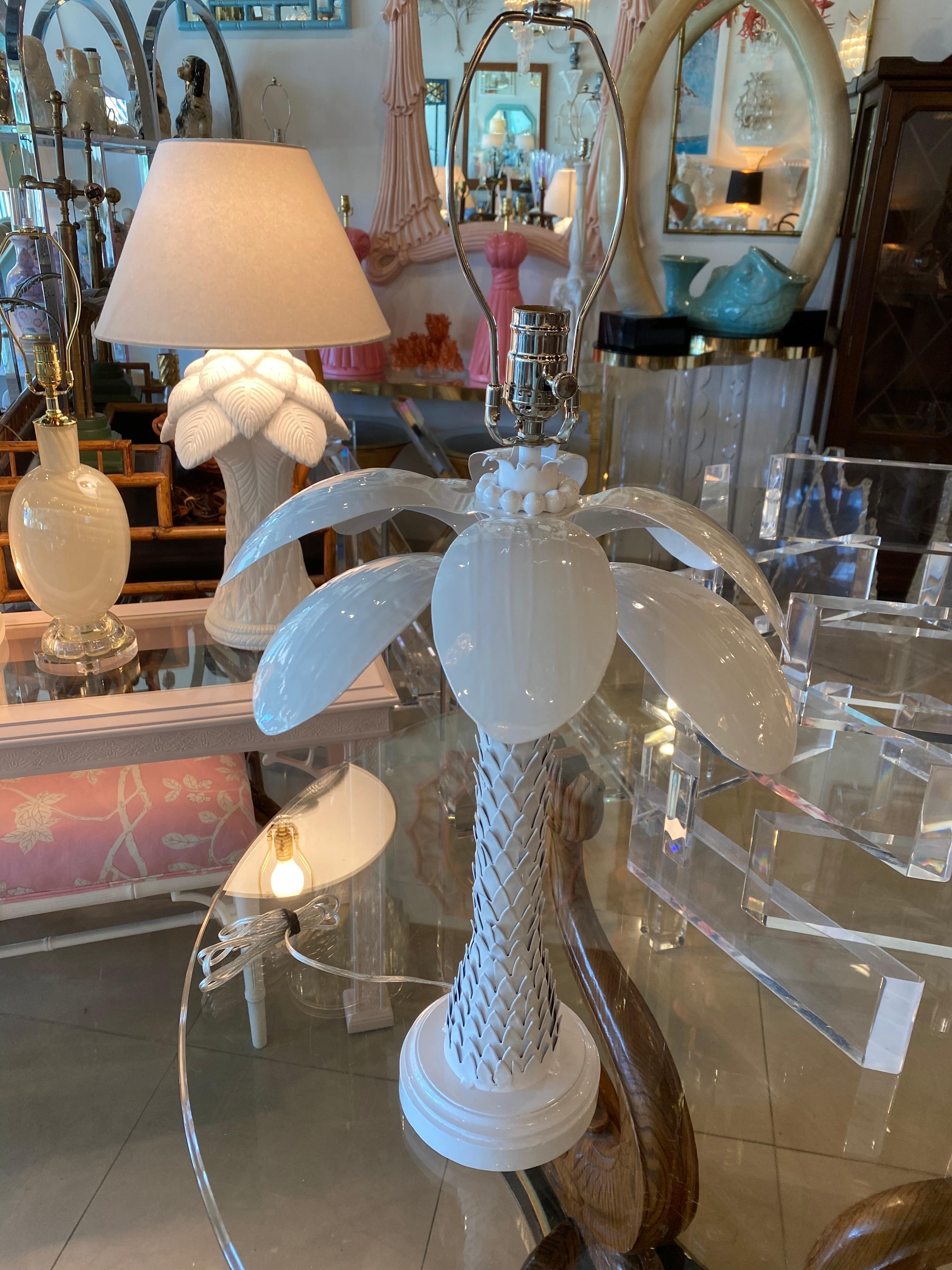 Lovely vintage metal palm leaf tree frond table lamp. This lamp is amazing! Has some nice weight to it! Completely restored to perfection! All new wiring, all new nickel hardware, 3 way sockets. I just love the Roche style trunk. 
23.25 to top of