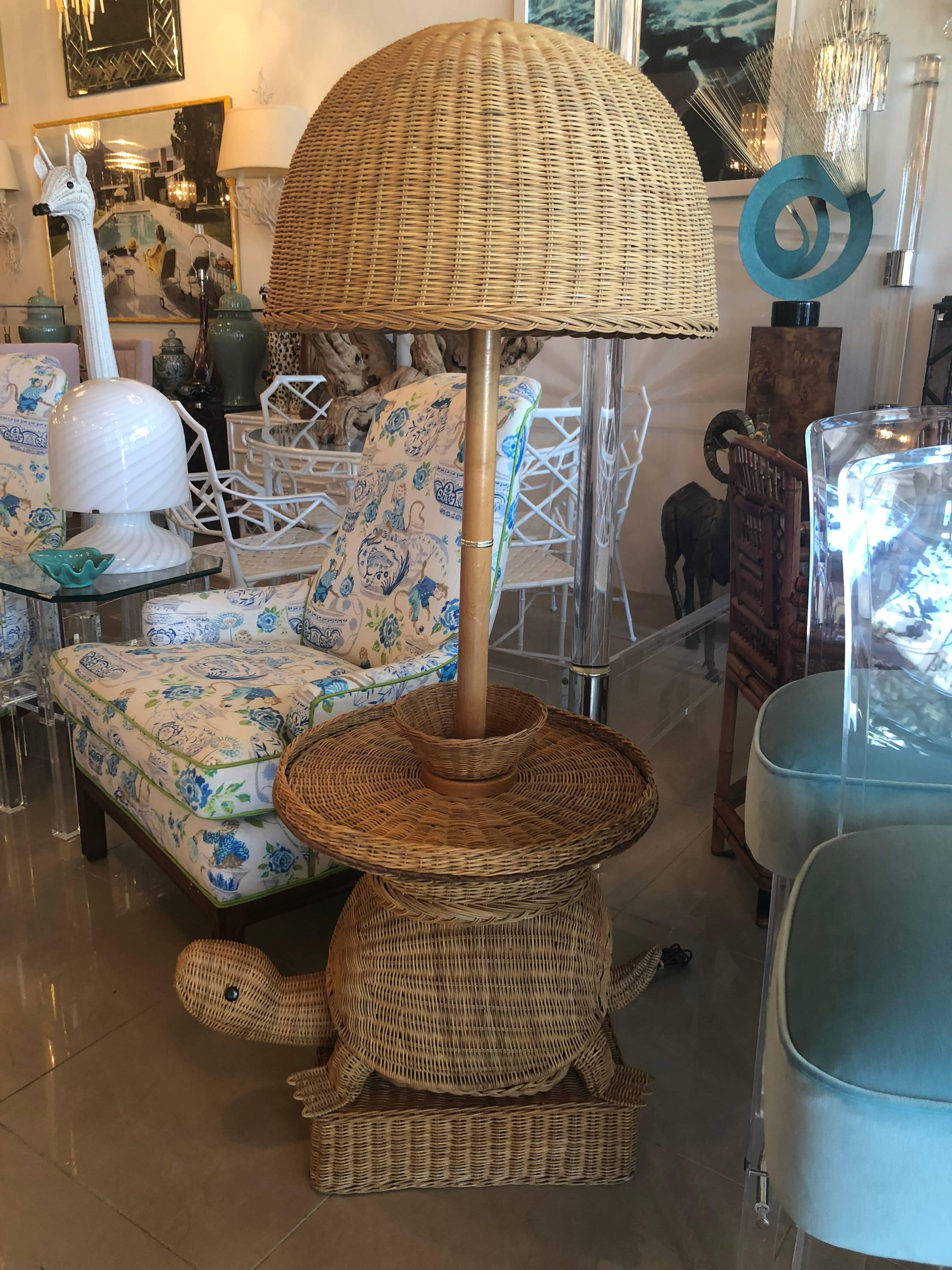 The perfect tropical, Palm Beach style Wicker turtle floor lamp. Doubles as an end or side table. Includes original Wicker lampshade. I just adore this!
