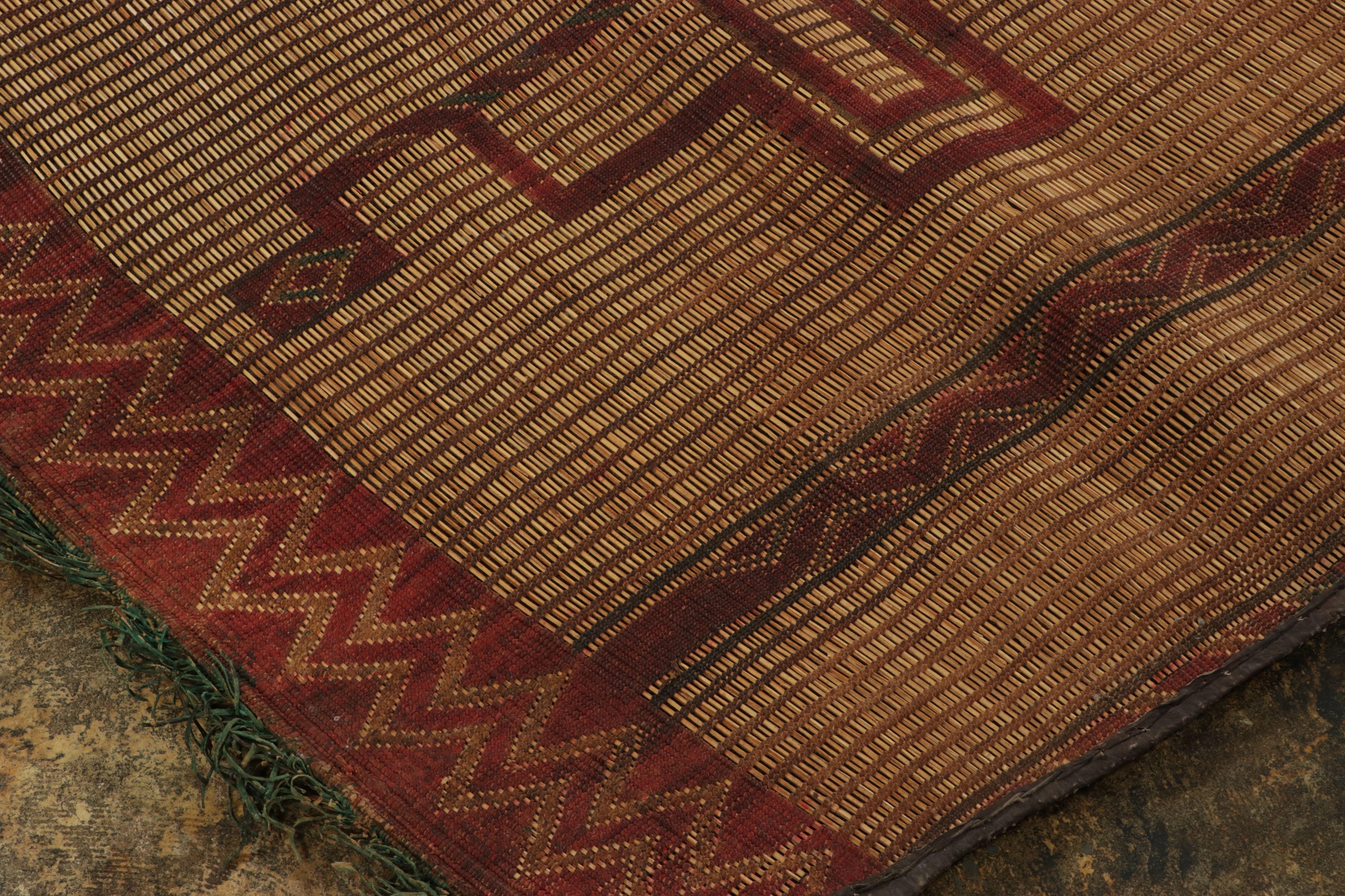 Made with handwoven reed and camel leather in Mauritania circa 1950-1960, this 10x13 vintage Tuarage mat is an exceptional new addition to Rug 
Kilim’s collection of rare works in this weaving tradition; the legacy of one of the most
