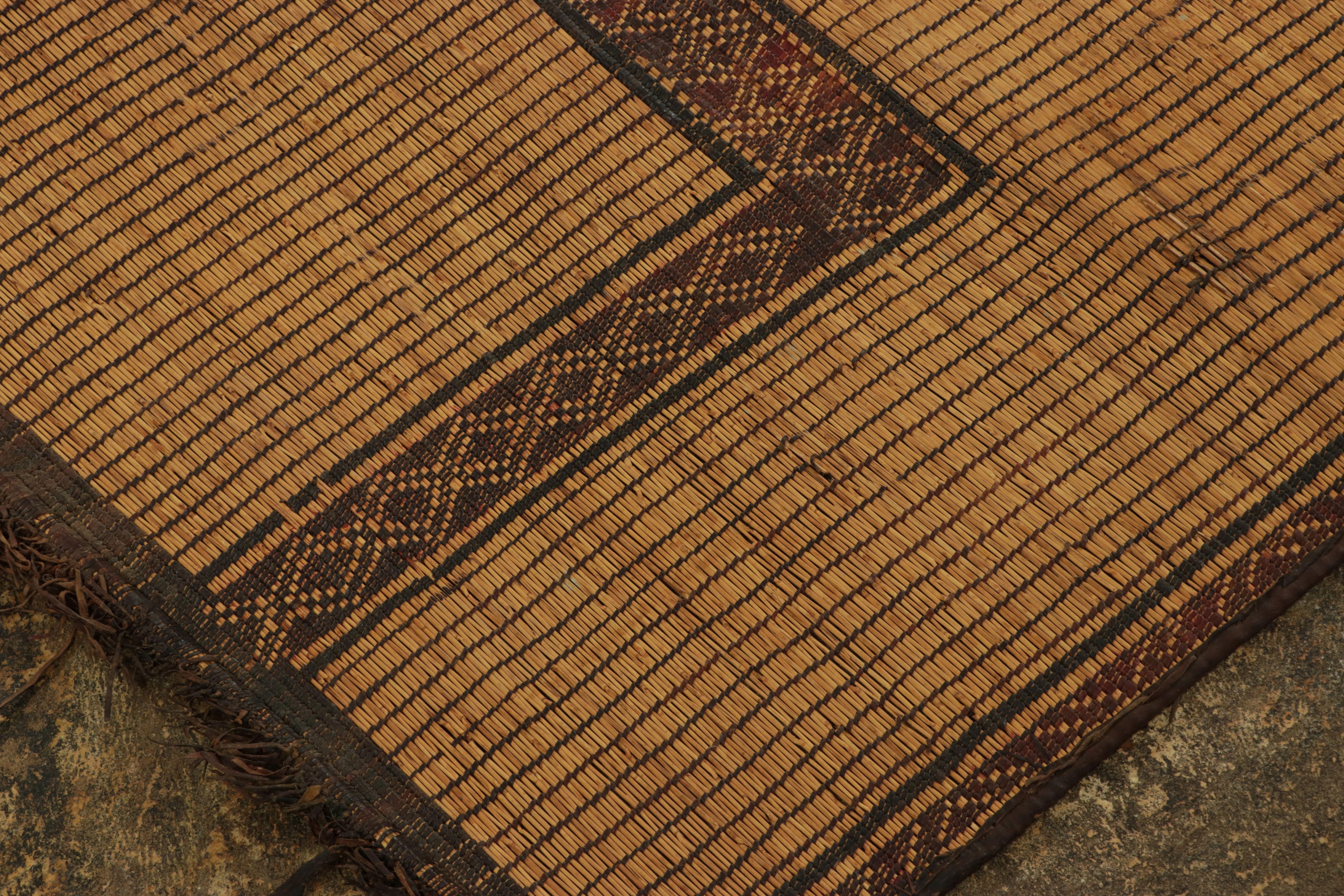 Made with handwoven reed and camel leather in Mauritania circa 1950-1960, this 10x13 vintage Tuarage mat is an exceptional new addition to Rug 
Kilim’s collection of rare works in this weaving tradition; the legacy of one of the most