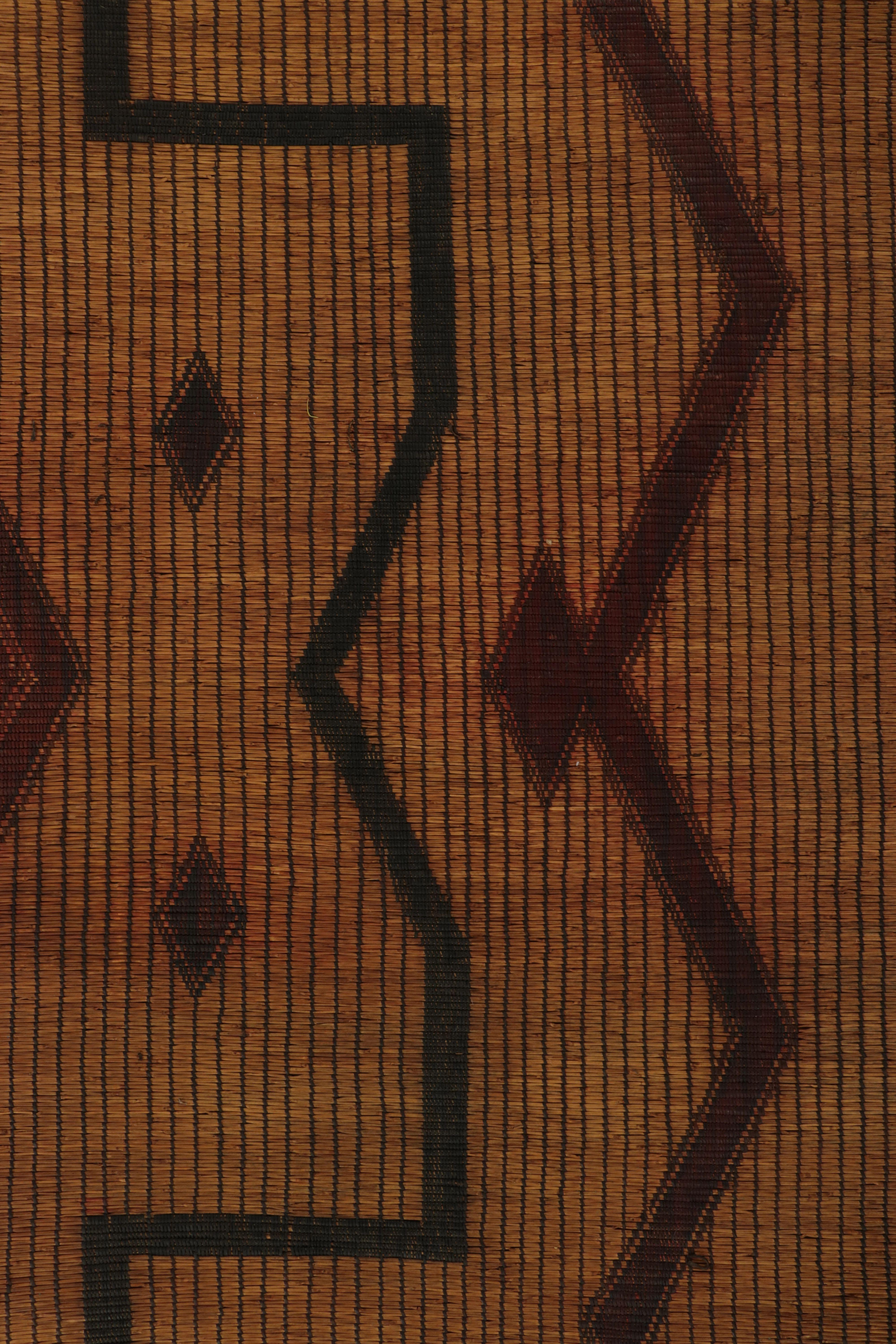 Made with handwoven reed and camel leather in Mauritania circa 1950-1960, this 10x13 vintage Tuarage mat is an exceptional new addition to Rug 
Kilim’s collection of rare works in this weaving tradition; the legacy of one of the most