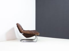 Vintage tube steel and leather lounge chair
