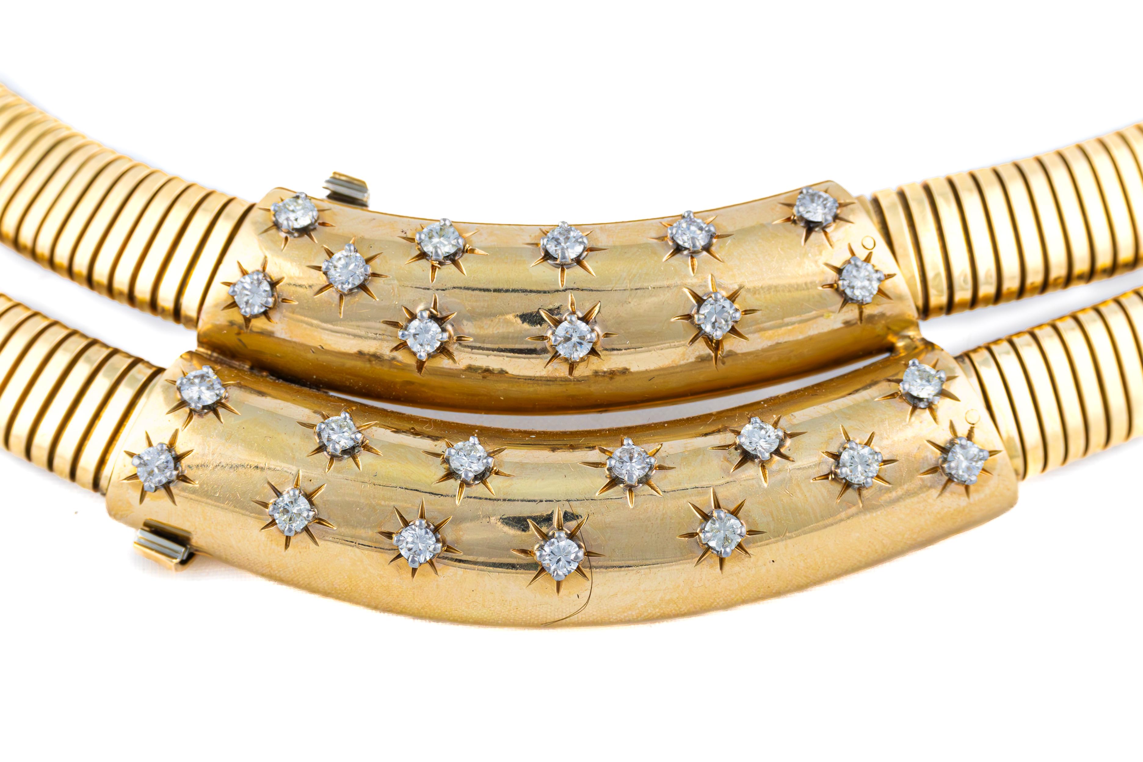 Vintage Tubogas Collar Diamond Necklace

This vintage Tubogas collar necklace embodies the elegance of mid-century Italian craftsmanship. Crafted in rich, high-polish 18k yellow gold, its supple, flexible tubing is enhanced by twin crescent-shaped