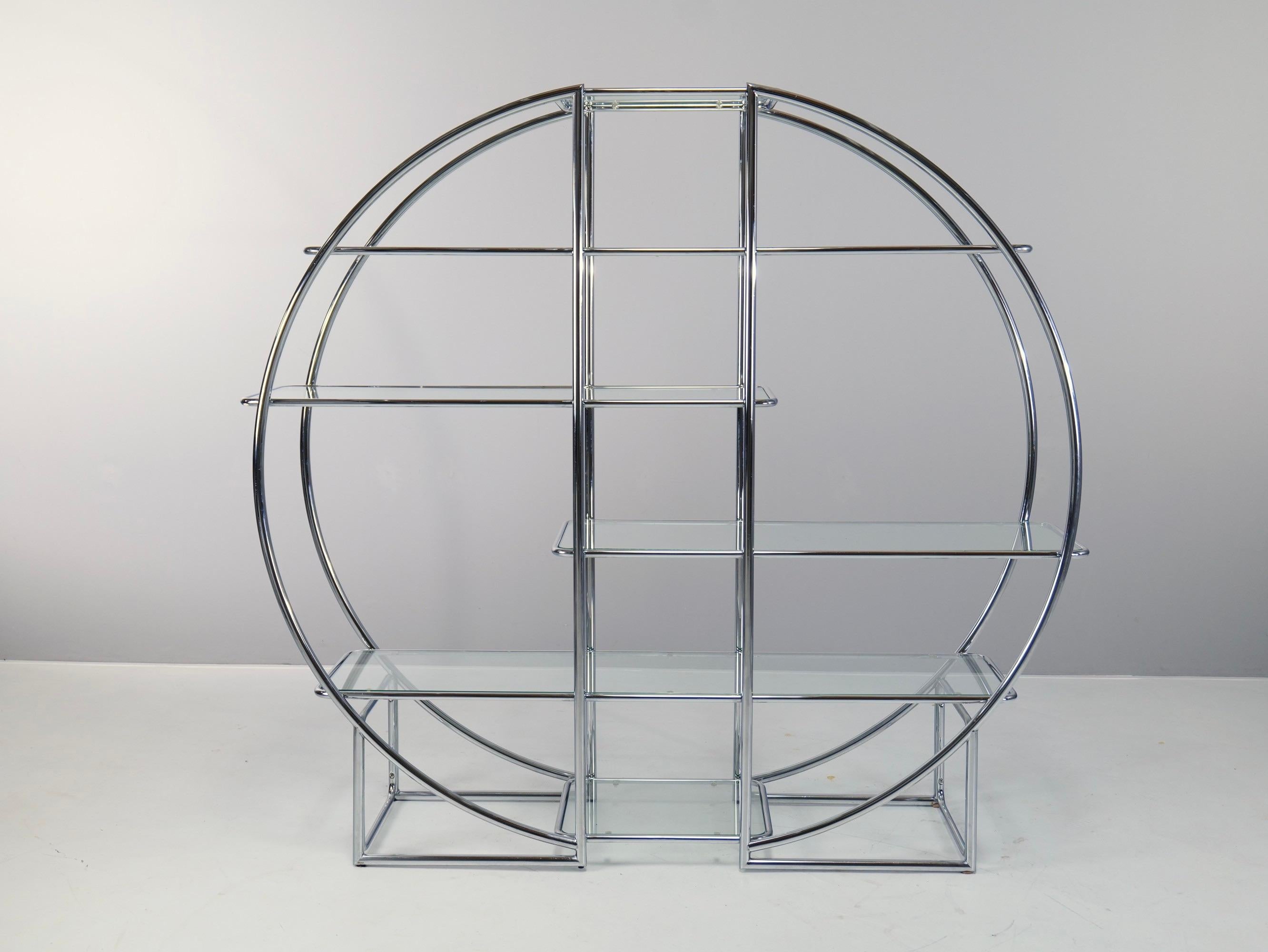 Bauhaus / Art Deco Style shelf or roomdivider from the early 1960's from germany.
This product has been only made by german steel manufacturers.

Made in Germany - 1960's
dimensions:
176 cm width
170 cm heigh
45 cm depth
materials:
tubular
