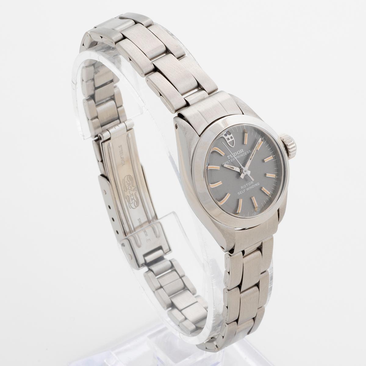 Our attractive vintage Tudor Oyster Princess reference 92100 features a steel case and Oyster bracelet with rare patinated dial, which in light shows shades of grey. The crown and caseback are Rolex and original . Presented in very good condition,