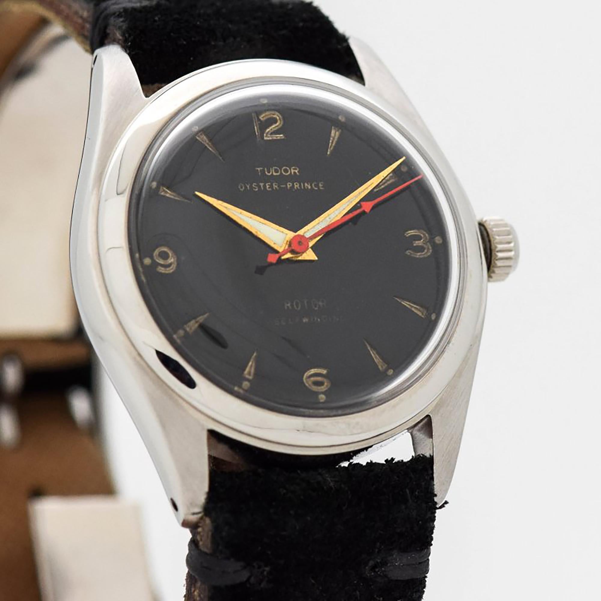 1953 Vintage Tudor Prince Ref. 7809 Stainless Steel watch with Rare Original Black Dial with Raised/Embossed Gold Color Arabic 3, 6, 9 & 12 with Elongated Arrow Markers. 34mm x 39mm lug to lug (1.34 in. x 1.54 in.) - Powered by a 17-jewel, automatic