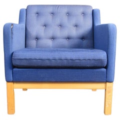 Fauteuil club bleu touffeté vintage