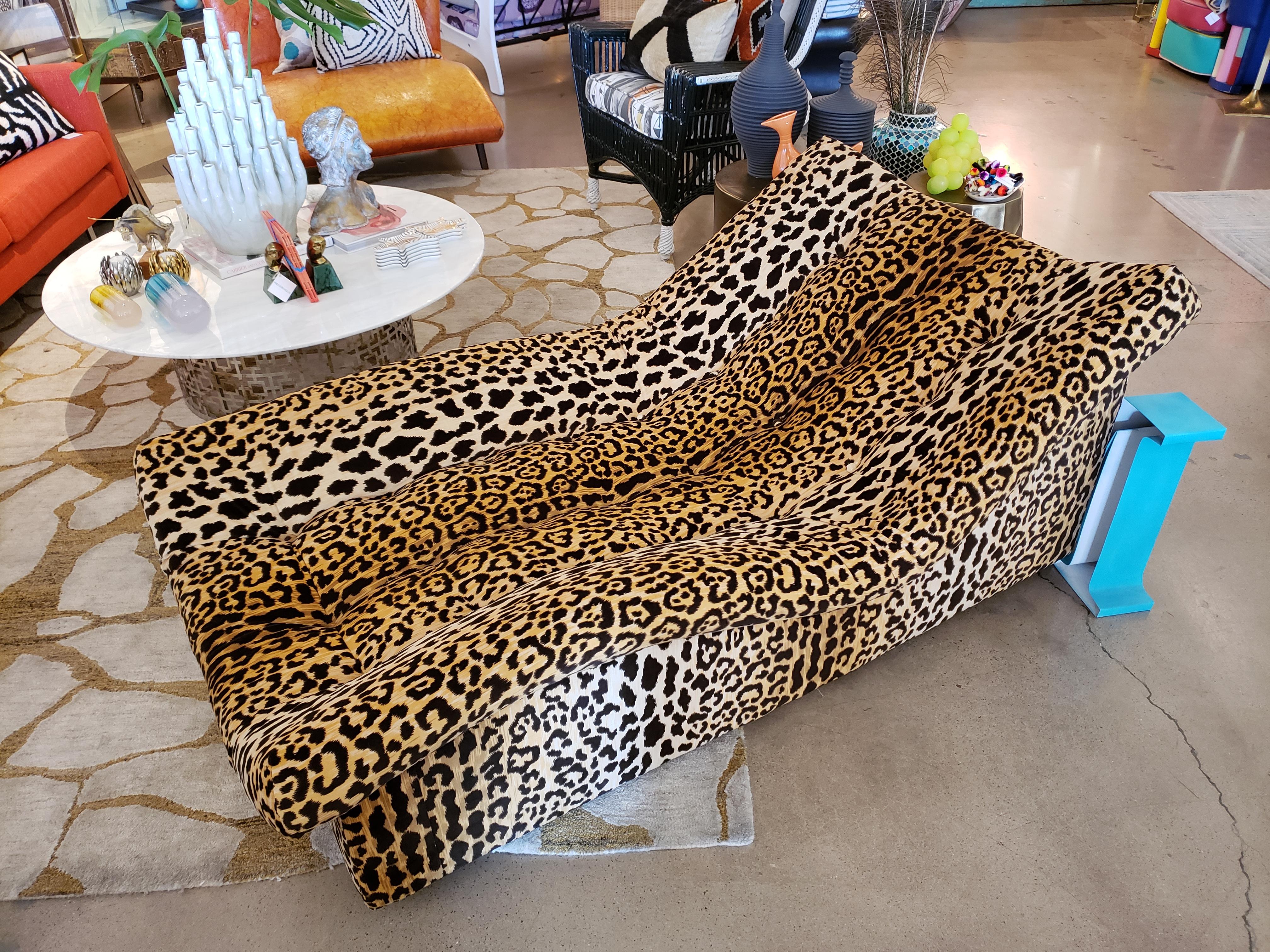 This is an example of true decadence! The Classic vintage midcentury appeal alongside the glamorous leopard material equals a Hollywood Regency piece of perfection. Newly recovered in a plush leopard velvet. Measures: L 60