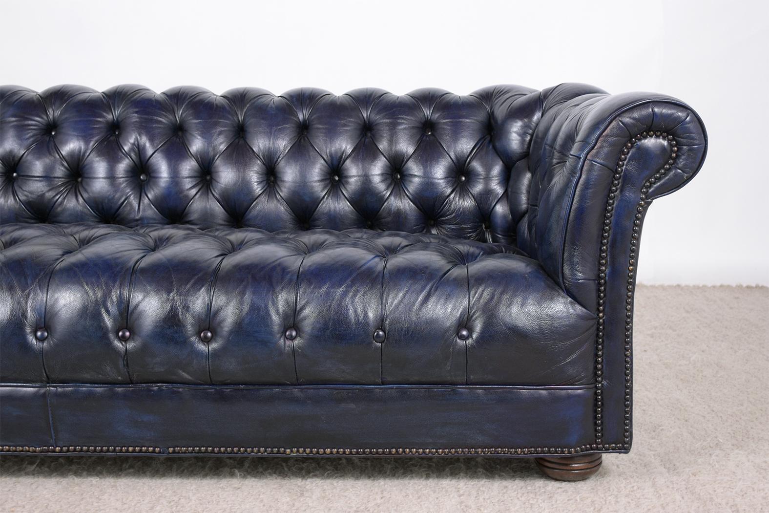 blue tufted leather sofa